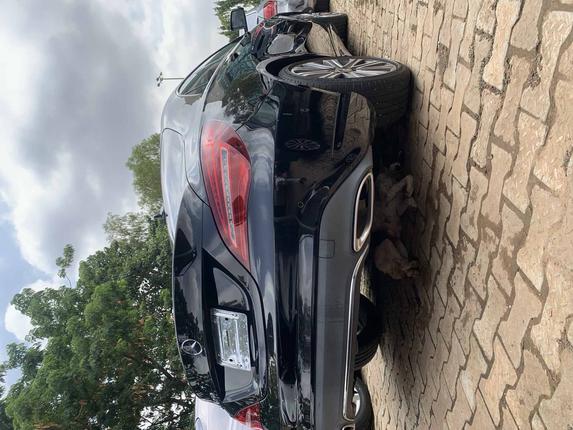 Car dealership activity documented in Abuja during morning hours