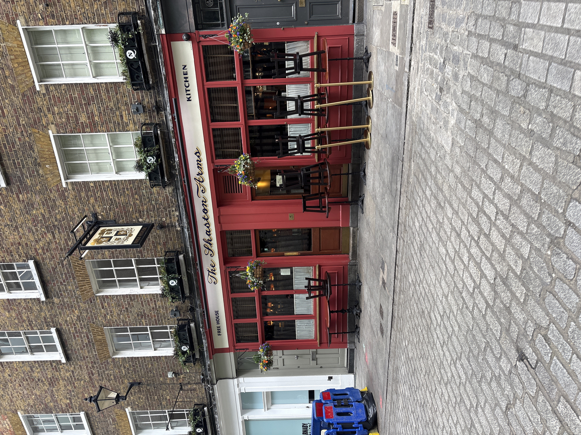 Morning walk past London pub captured on street