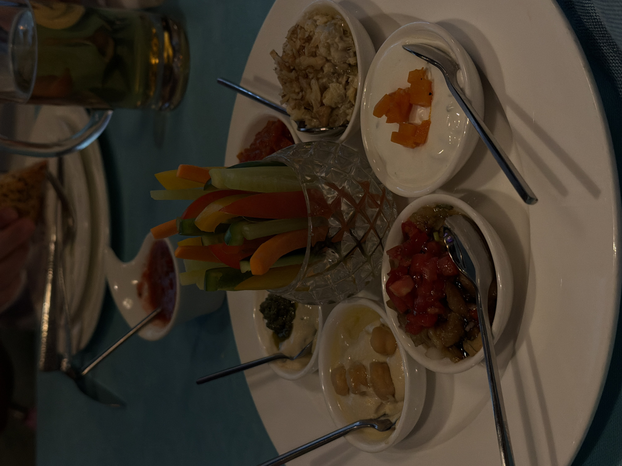 Group shares traditional meal in Tashkent restaurant setting