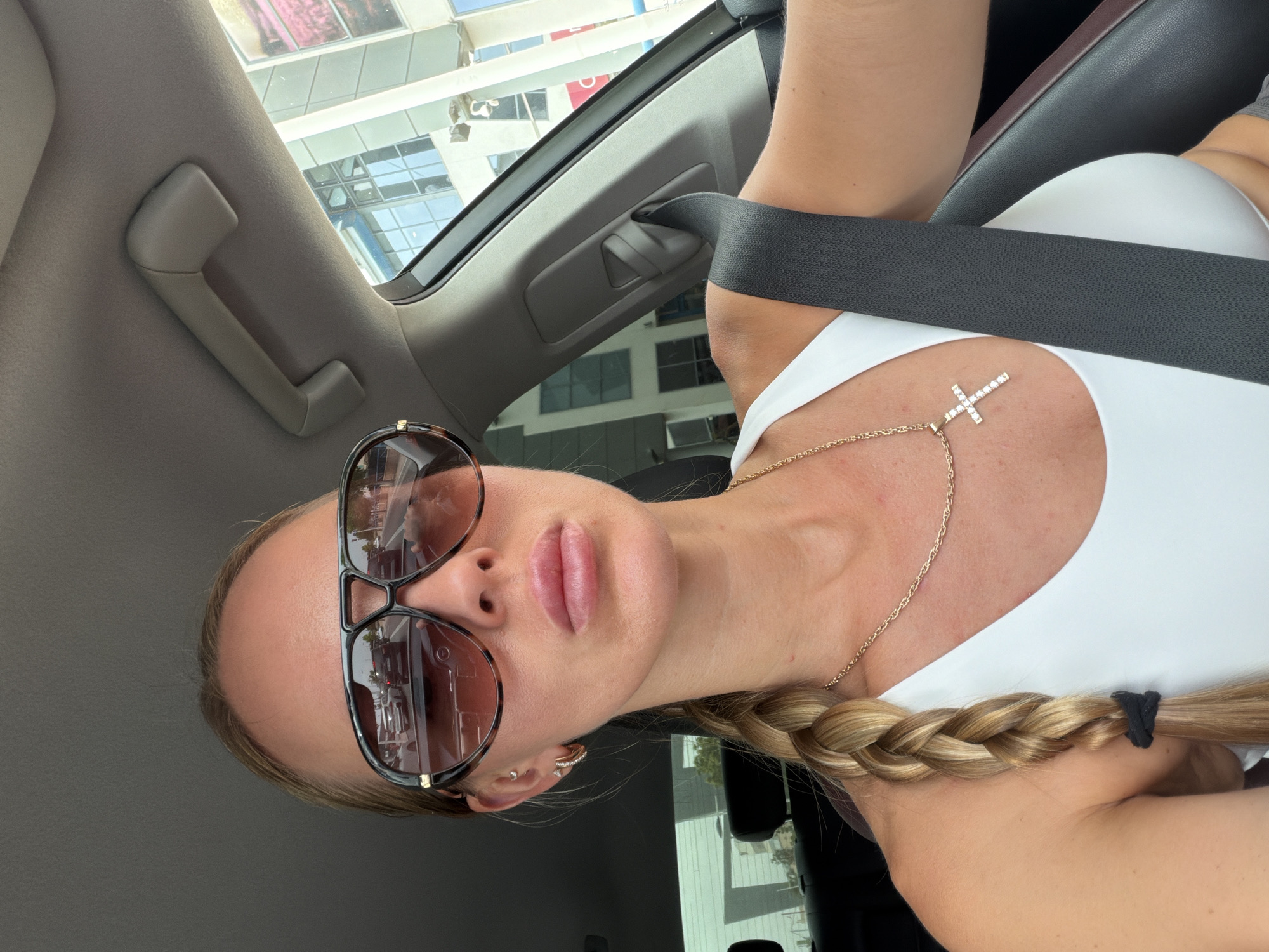 Driving through Finestrat with a black taxi close behind