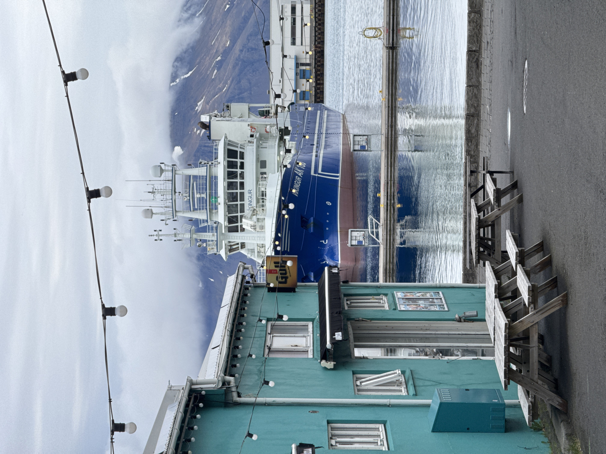 Waterfront establishment documented in Reykjavik on cloudy evening