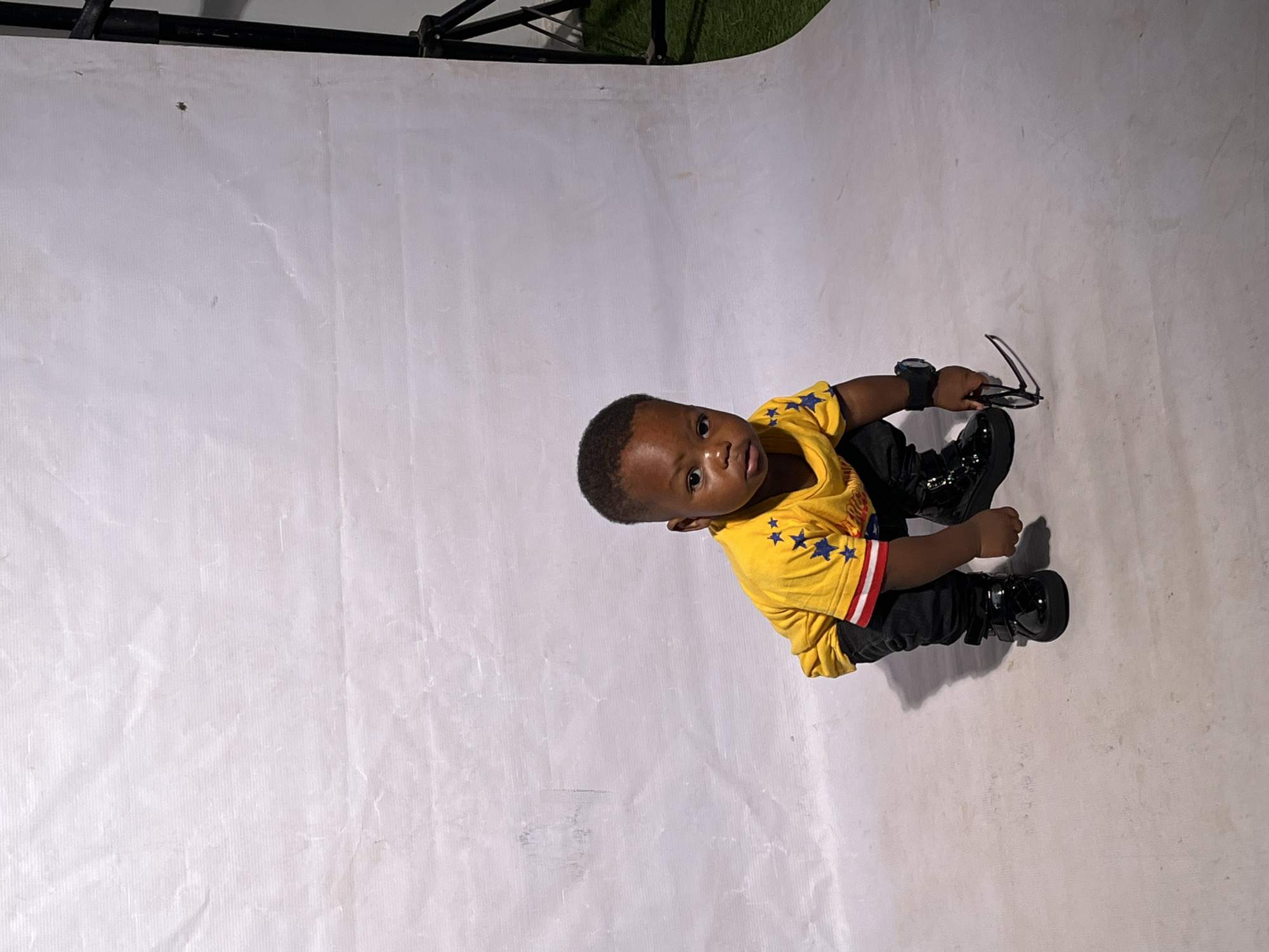 Children's traditional portrait session documented in Nigerian studios