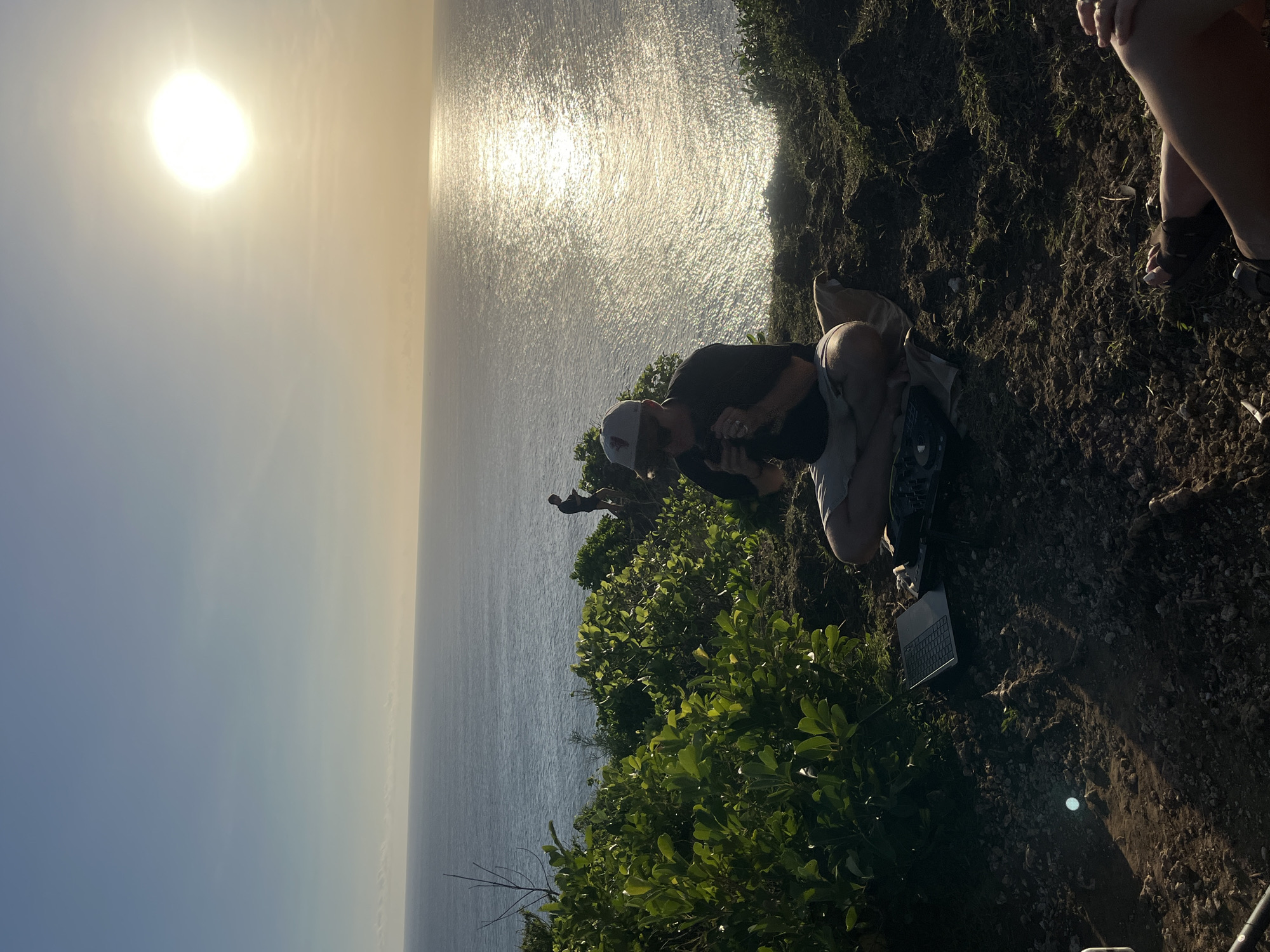 Clifftop DJ session and coastal scenes documented in Kuta Selatan