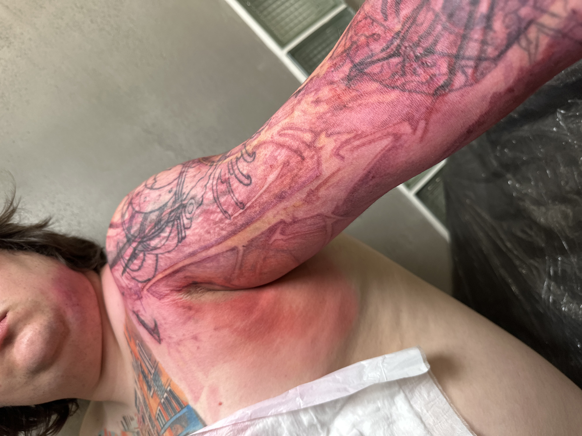 Fresh tattoo work documented in Moscow showing colorful design