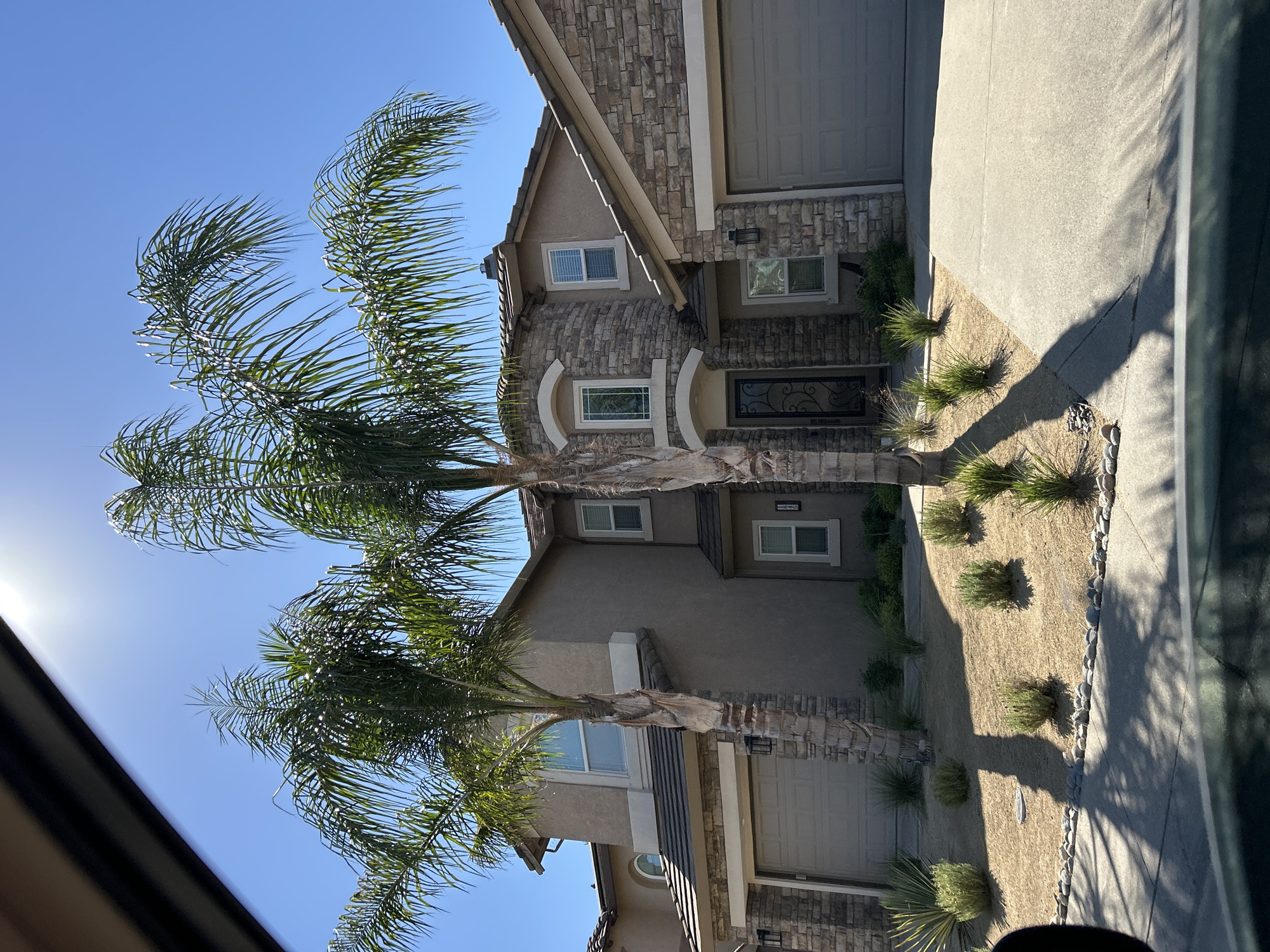 Roseville neighborhood: home, garden planters, and a Corvette C8
