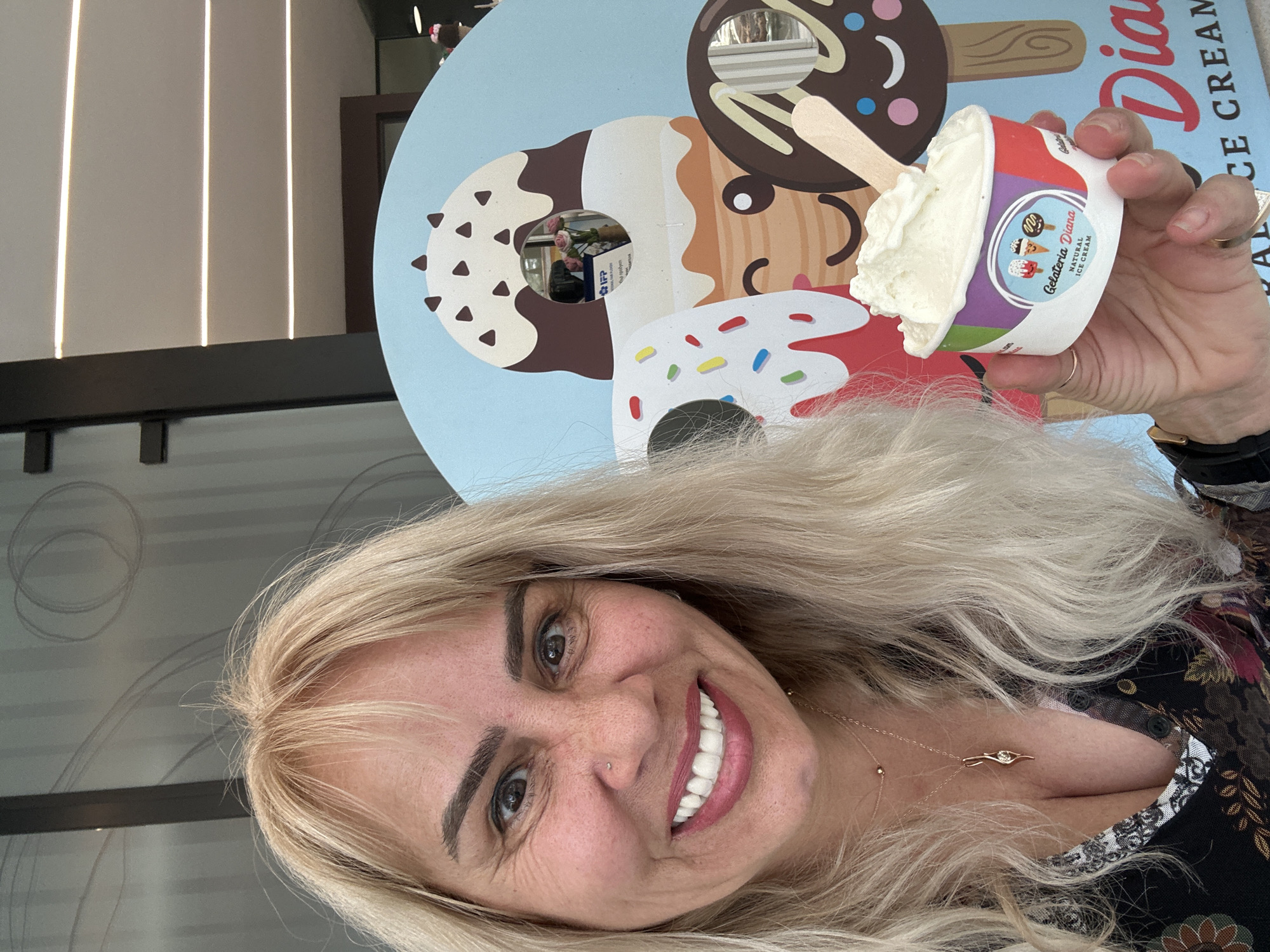 Woman enjoys ice cream selfie moment in Sofia