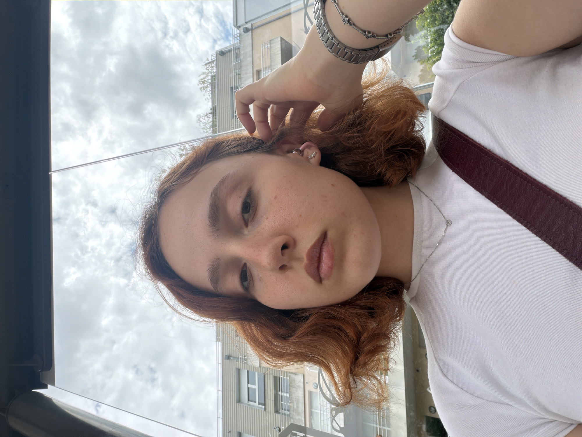 Quick selfie series across a Strasbourg building, late June morning
