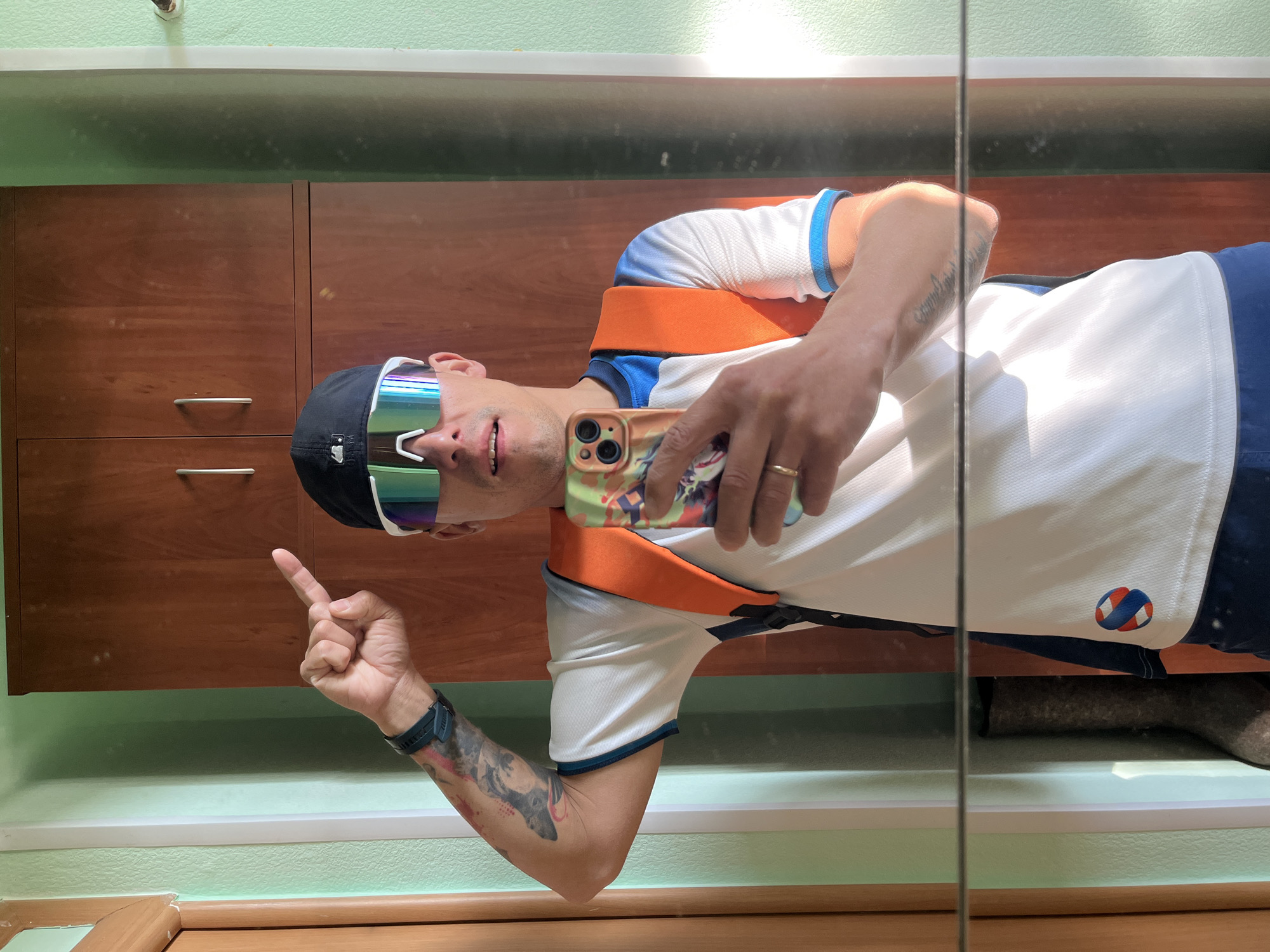 Man takes mirror selfies in multiple outfits in Chaikovsky