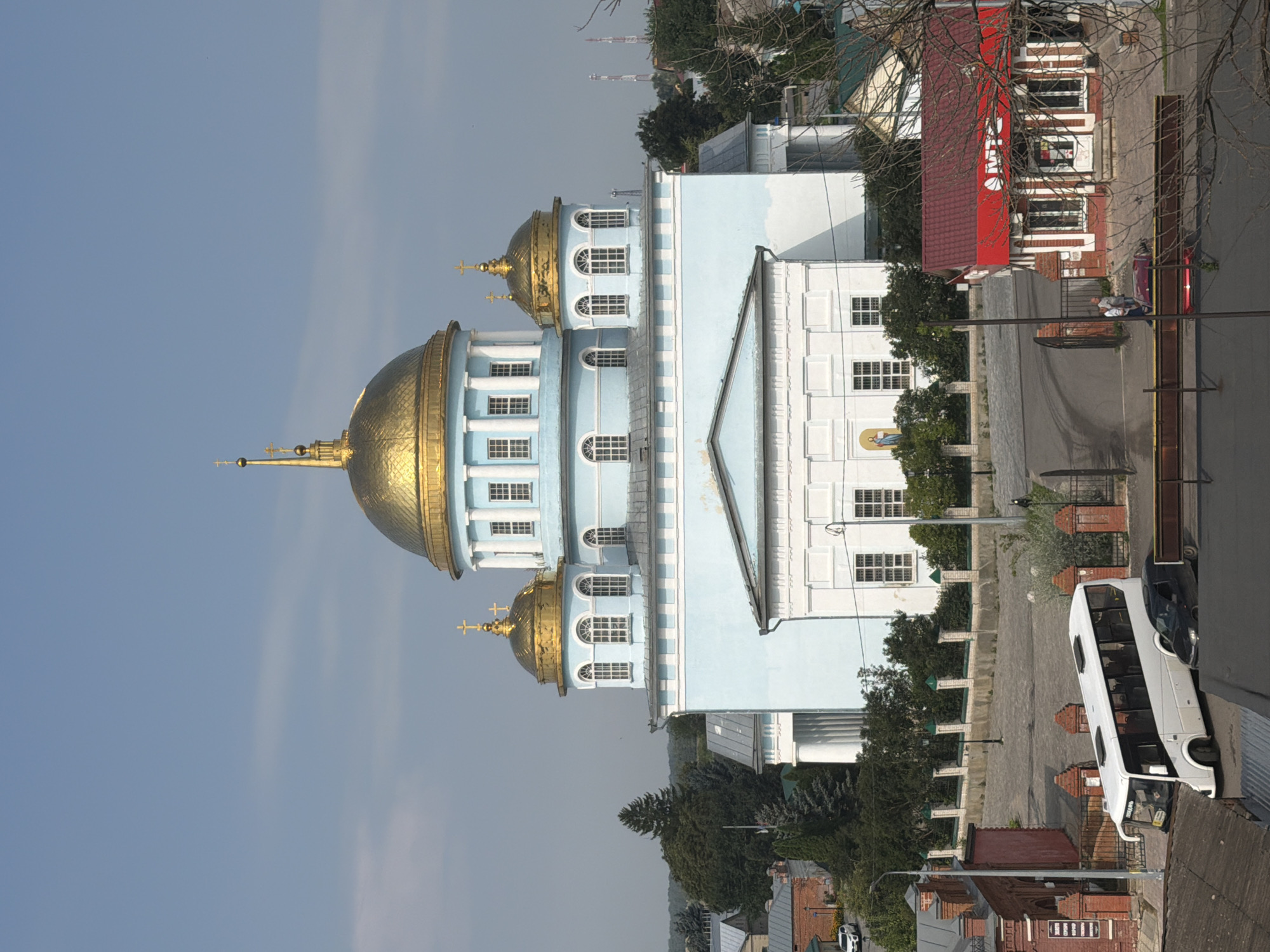 Cathedral exterior and quirky taxidermy décor in Lebedyan, Russia