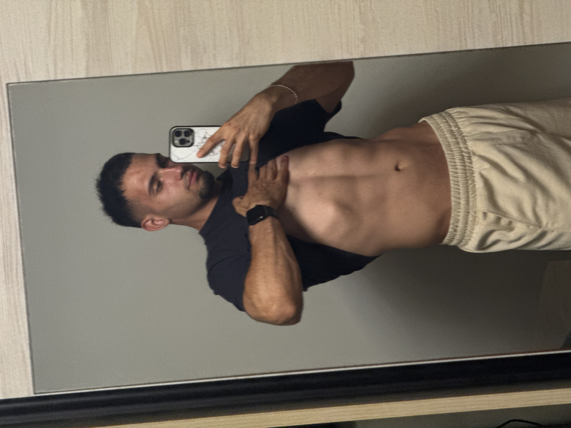 Mirror selfie in Shumen bedroom, flexing for the camera
