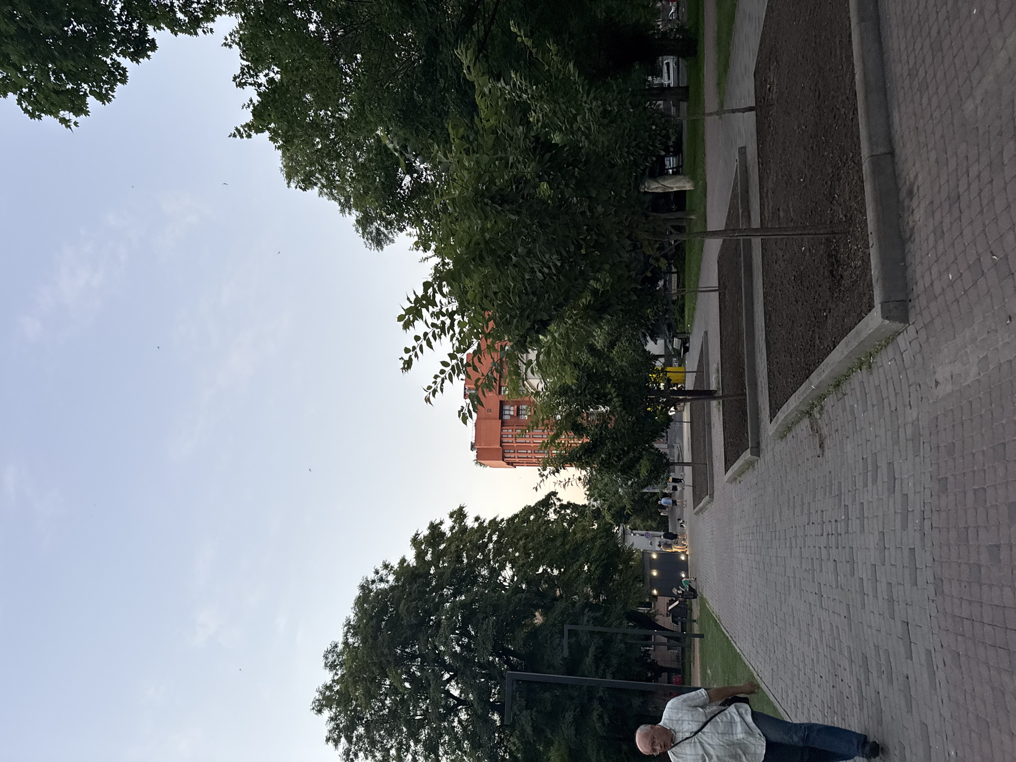 Evening in a Dnipro park: fountains, staircases, and street life