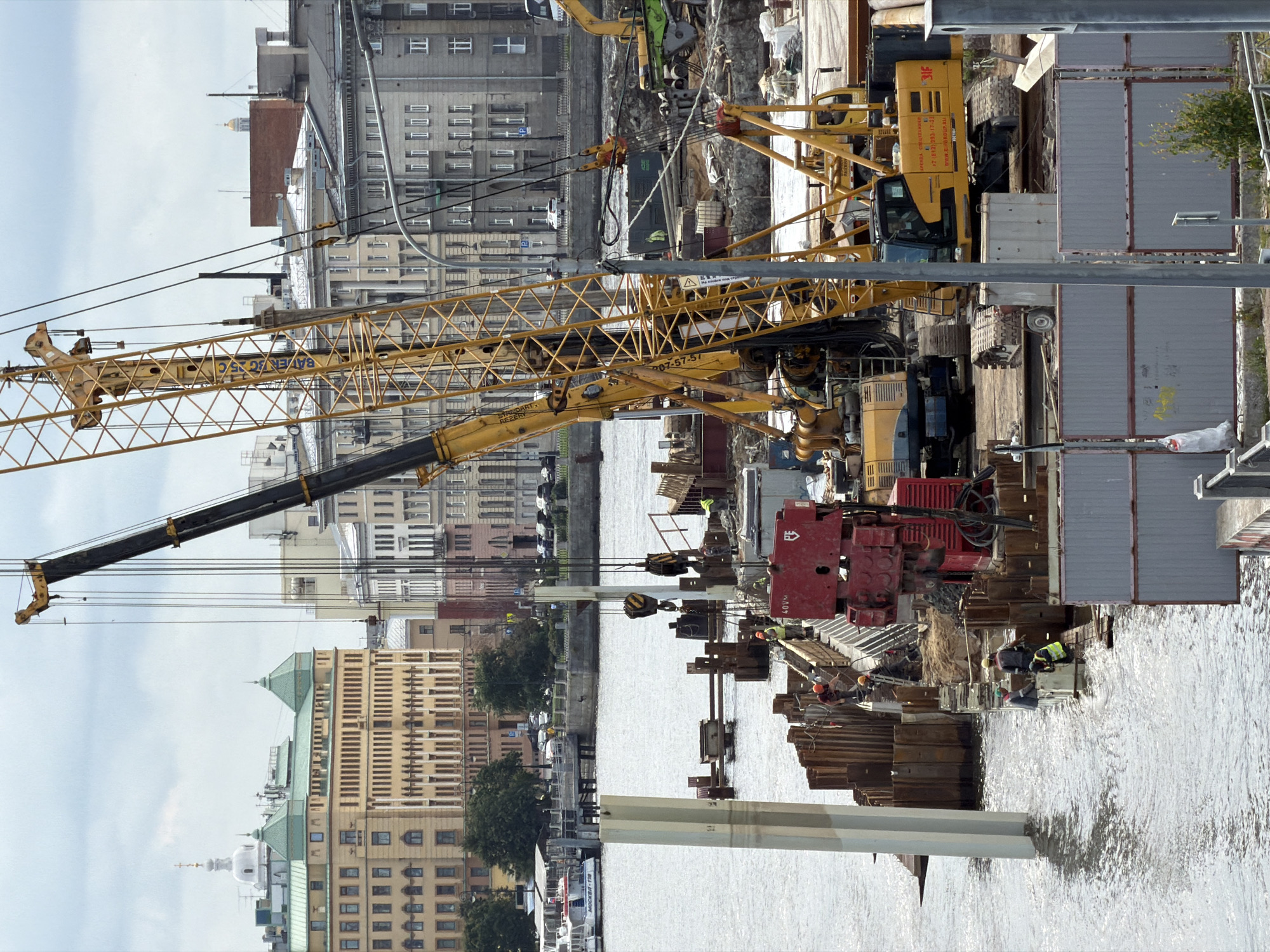 Neva River waterfront: construction, hydrofoils, and city views