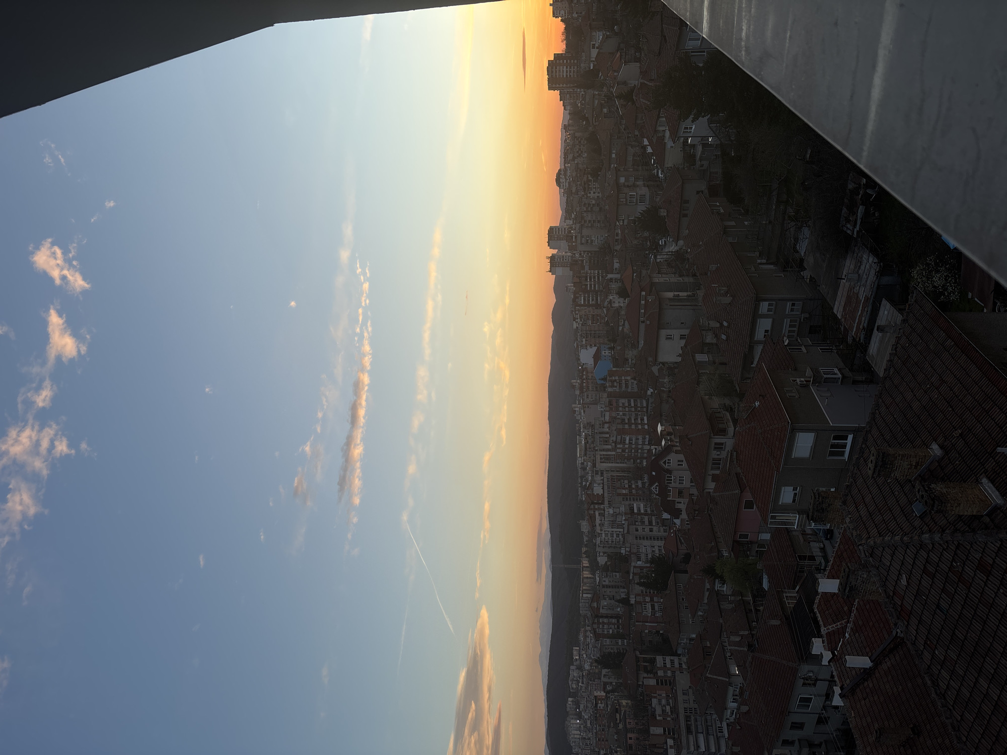 Sunset observed over red-roofed buildings in Veliko Tarnovo, Bulgaria