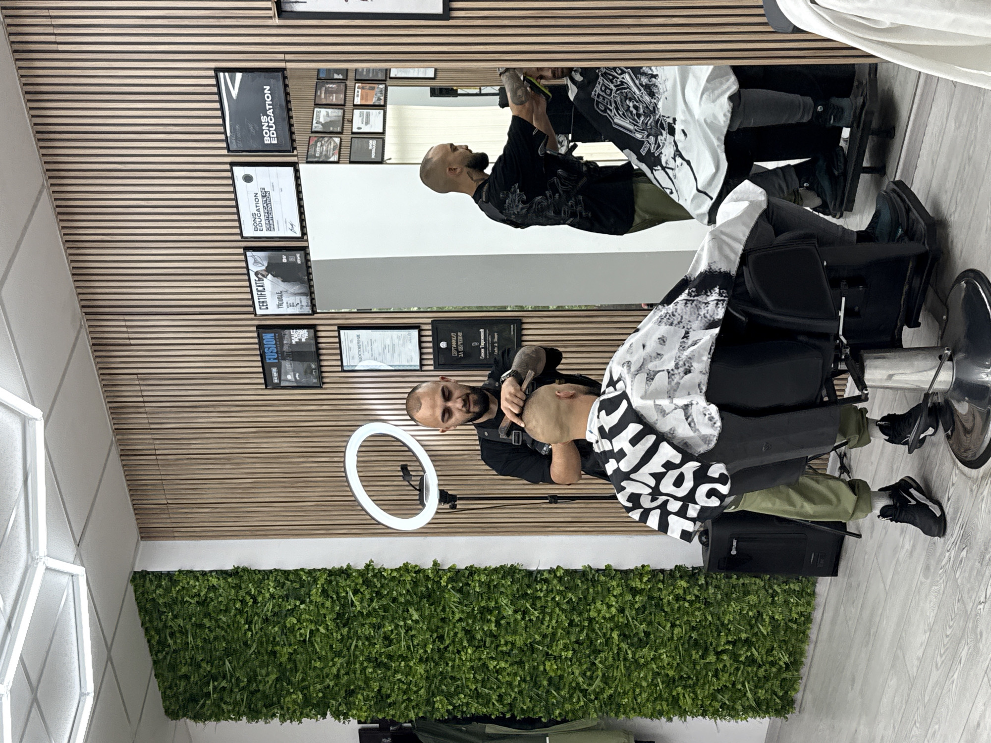Early morning haircut session captured at Sofia barbershop