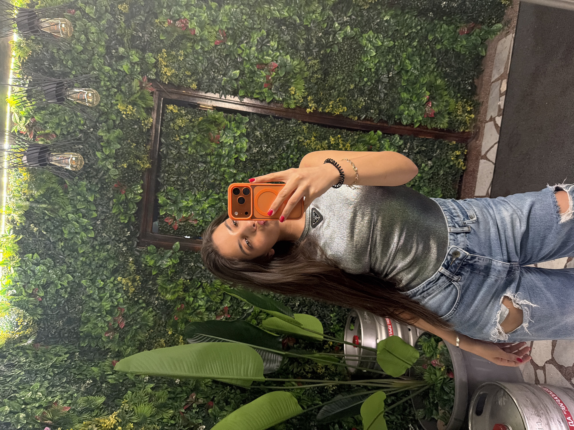 Woman documents restaurant visit with selfies in Rudartsi, Bulgaria