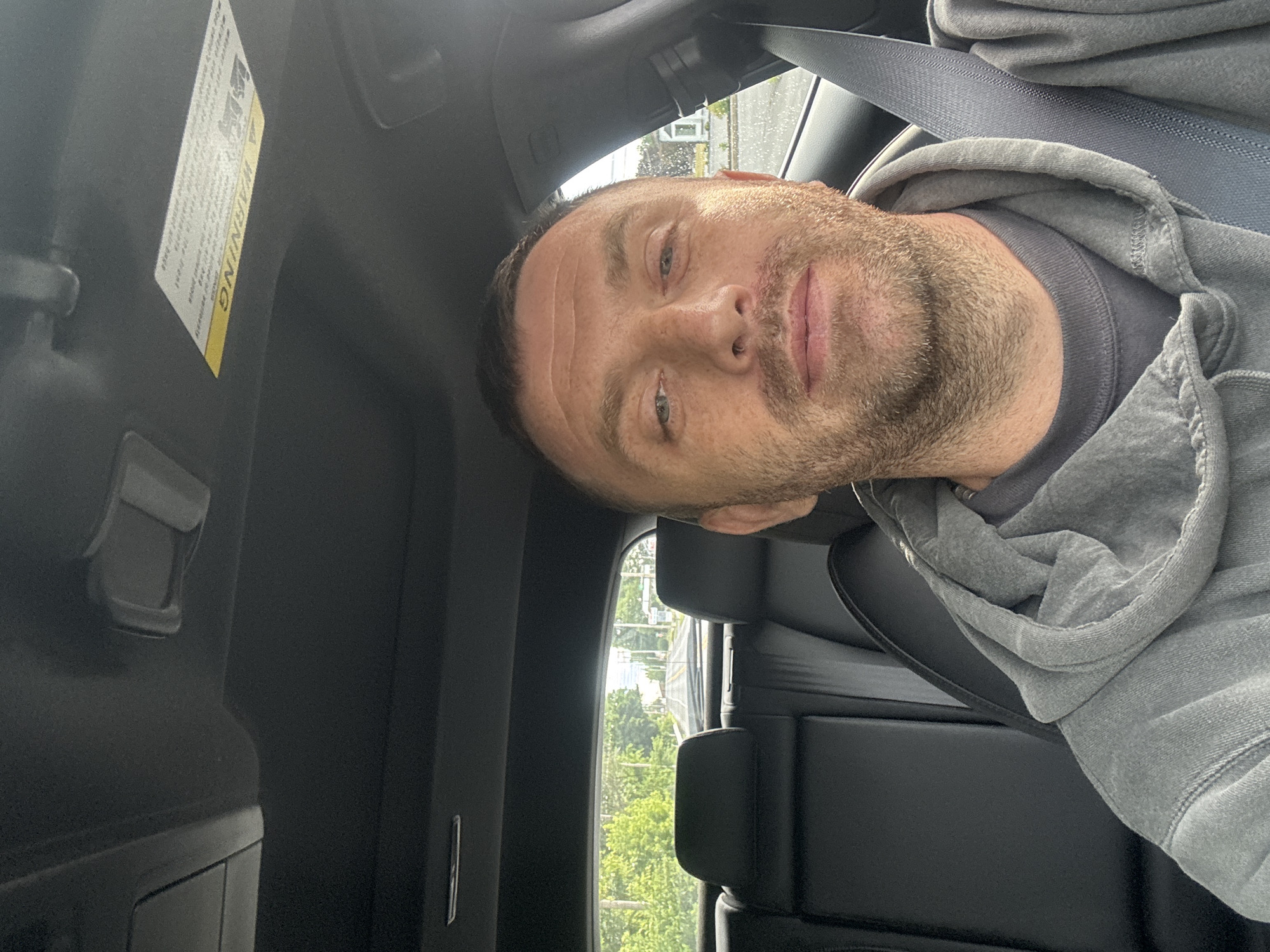 Suburban errands and a garage teardown on a cloudy day