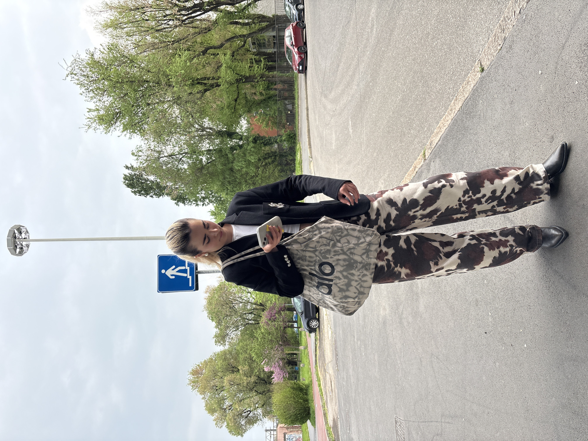 Woman in cow-print pants spotted on Milan street