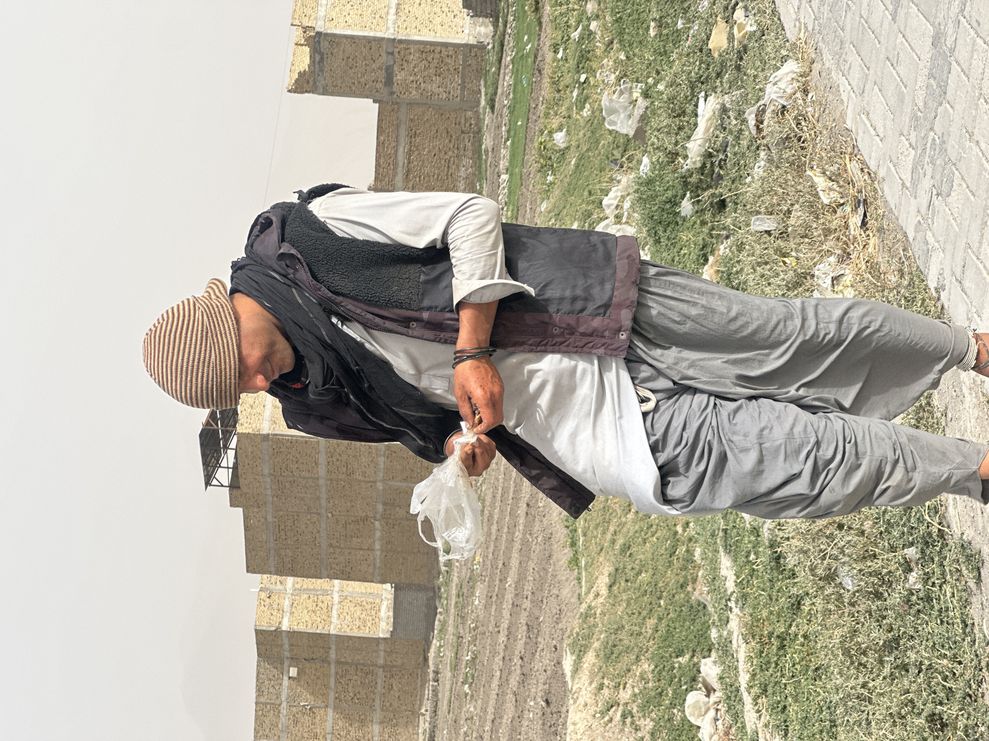 Man observed outdoors in Quetta during overcast morning
