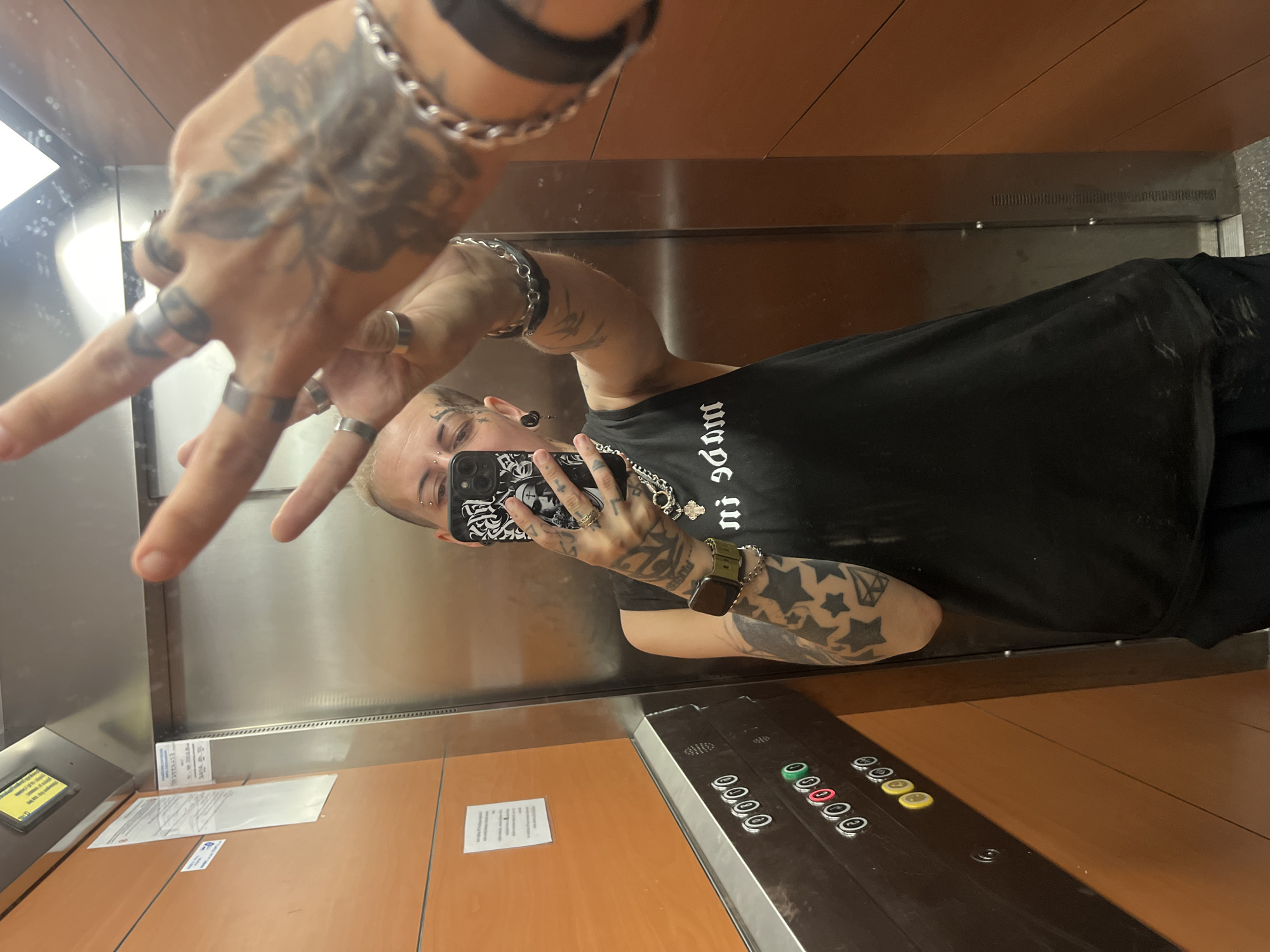 Elevator selfie, wildflower, and a motivational quote from Daugavpils