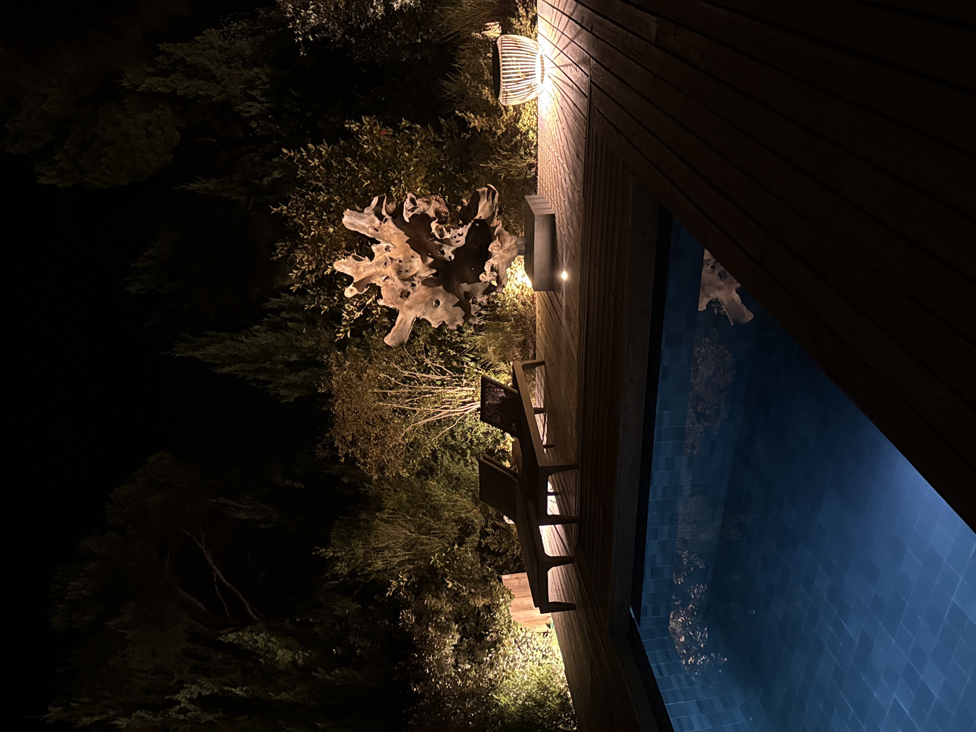 Illuminated backyard pool at night, Grândola, Portugal