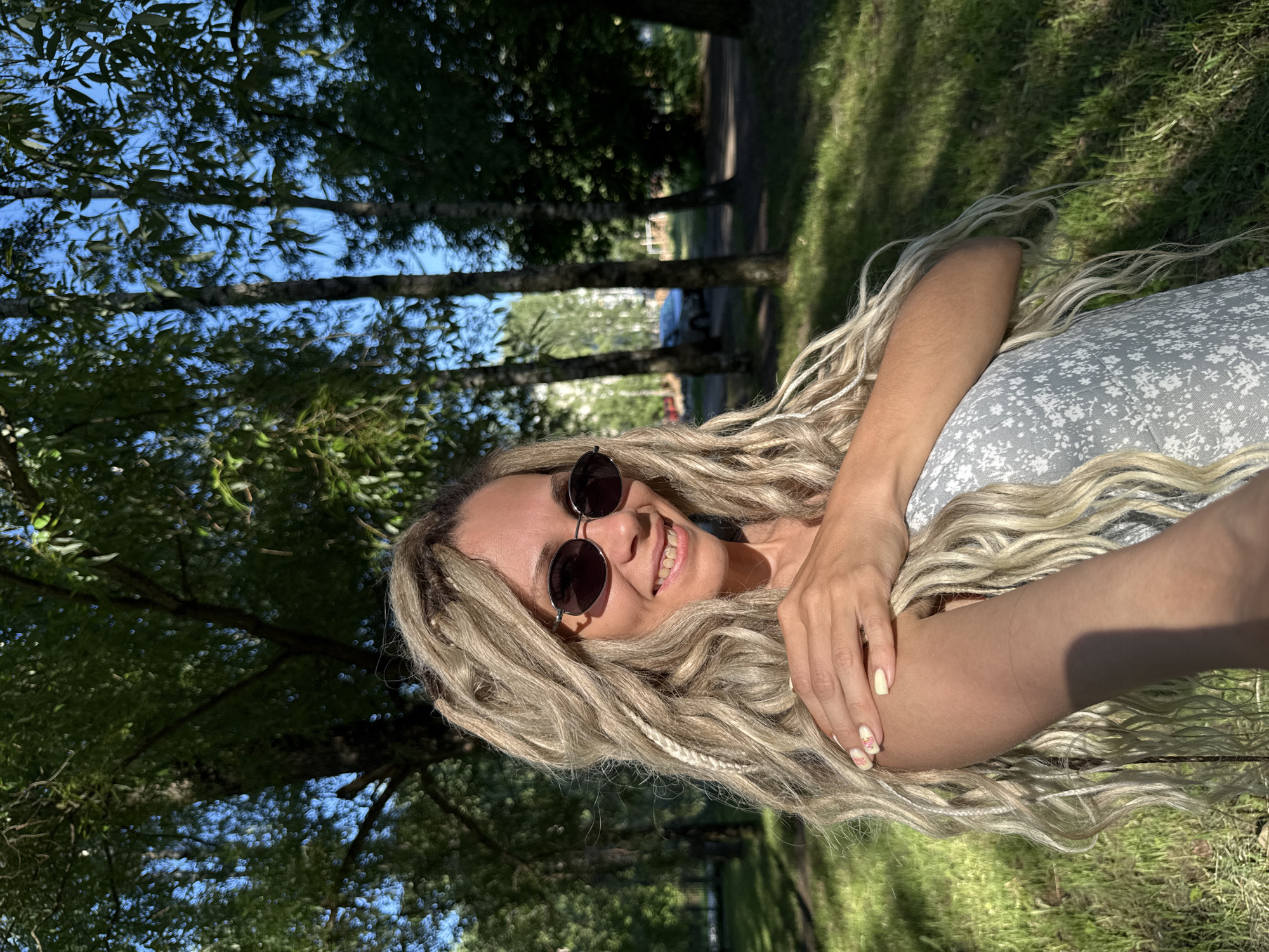 Woman takes selfie in Rusanovo park