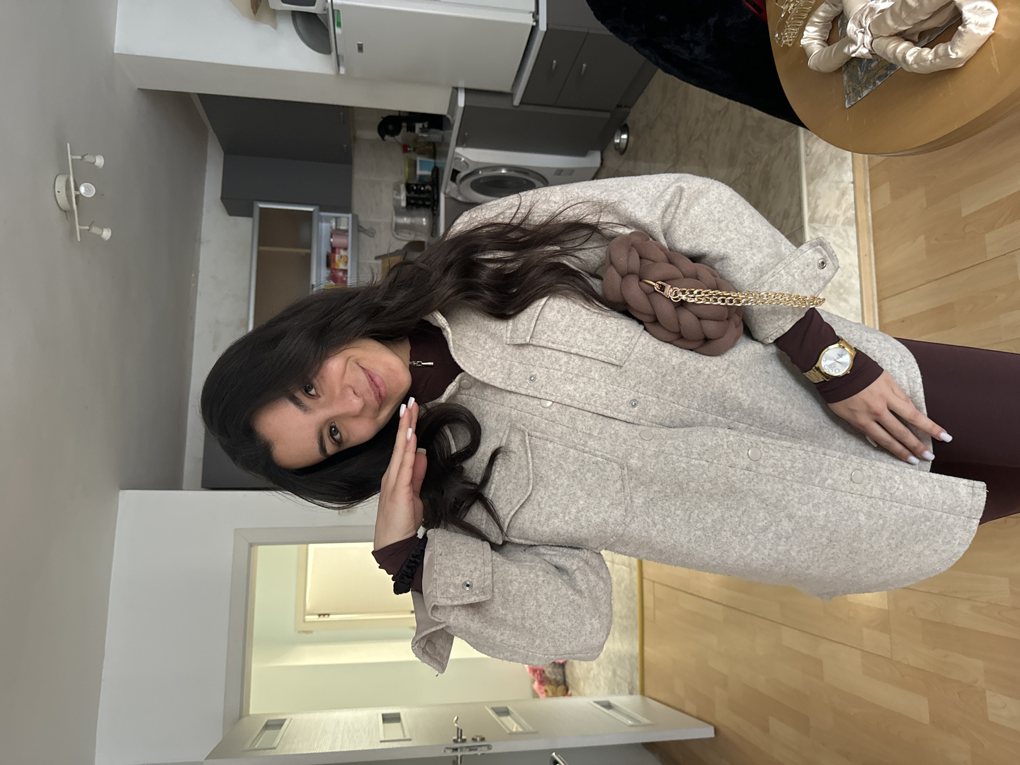 Woman spotted indoors in Varna wearing brown outfit