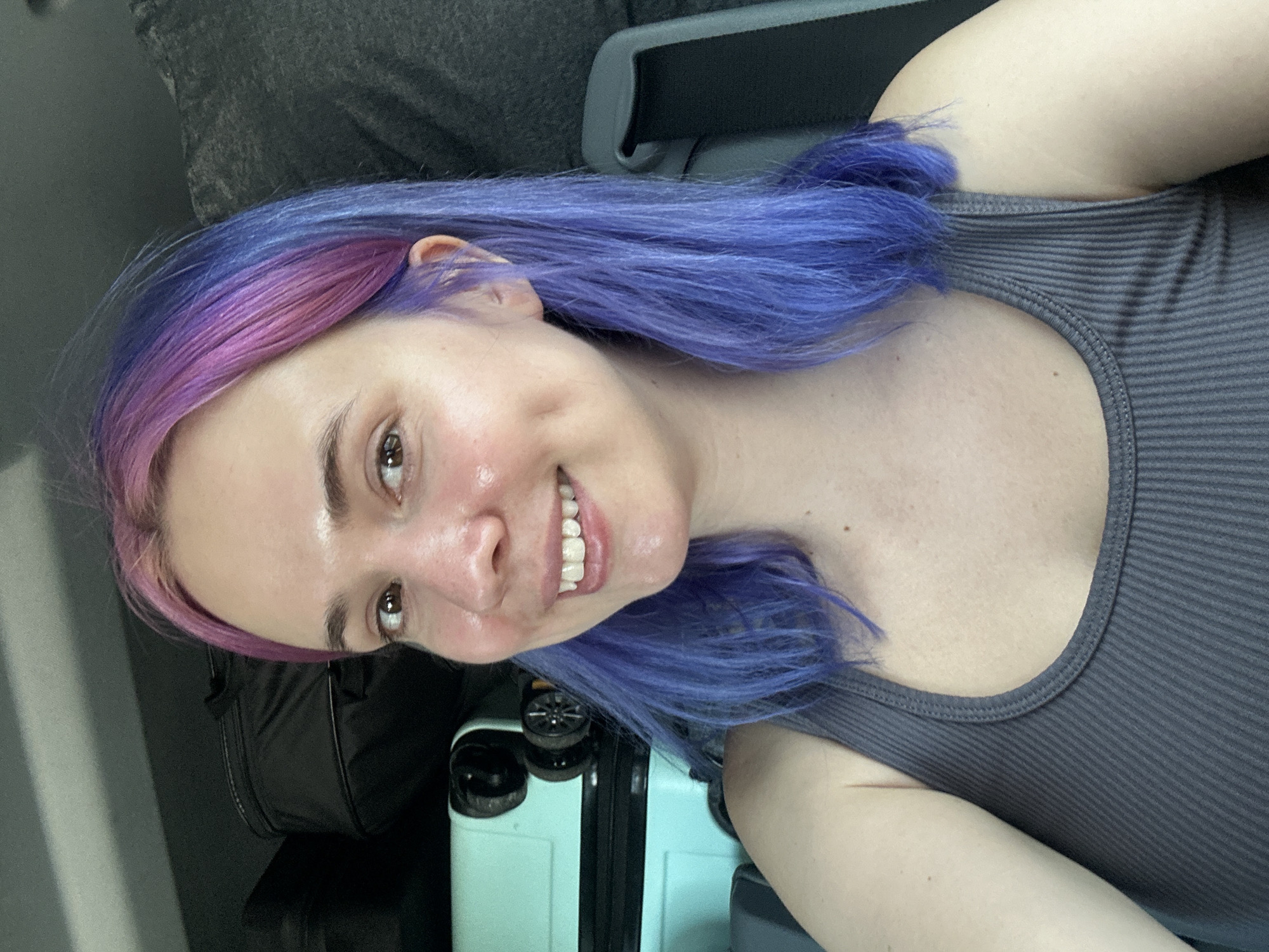 Woman takes travel selfie in vehicle in Slovenia