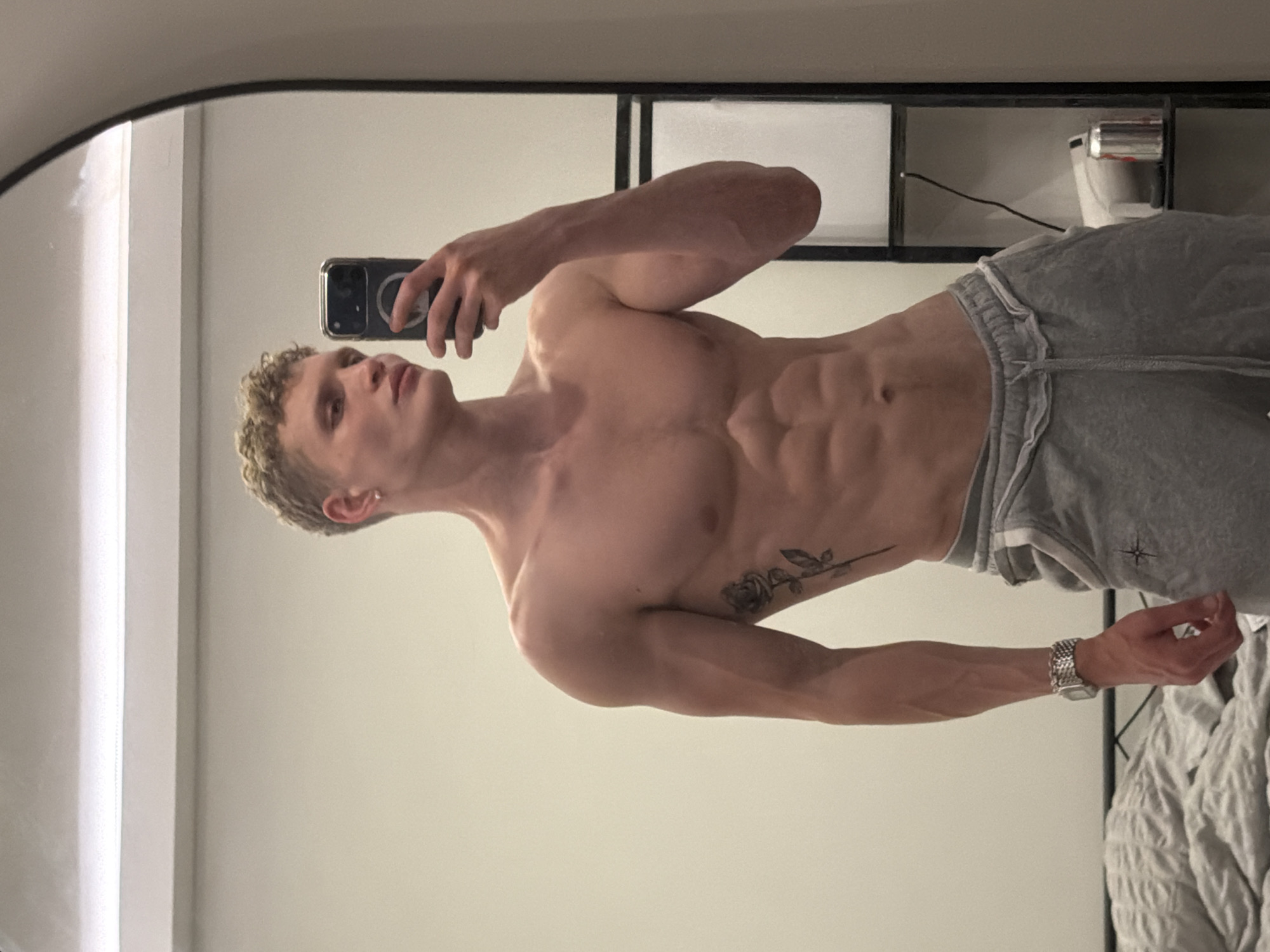 Man takes mirror selfie indoors in London