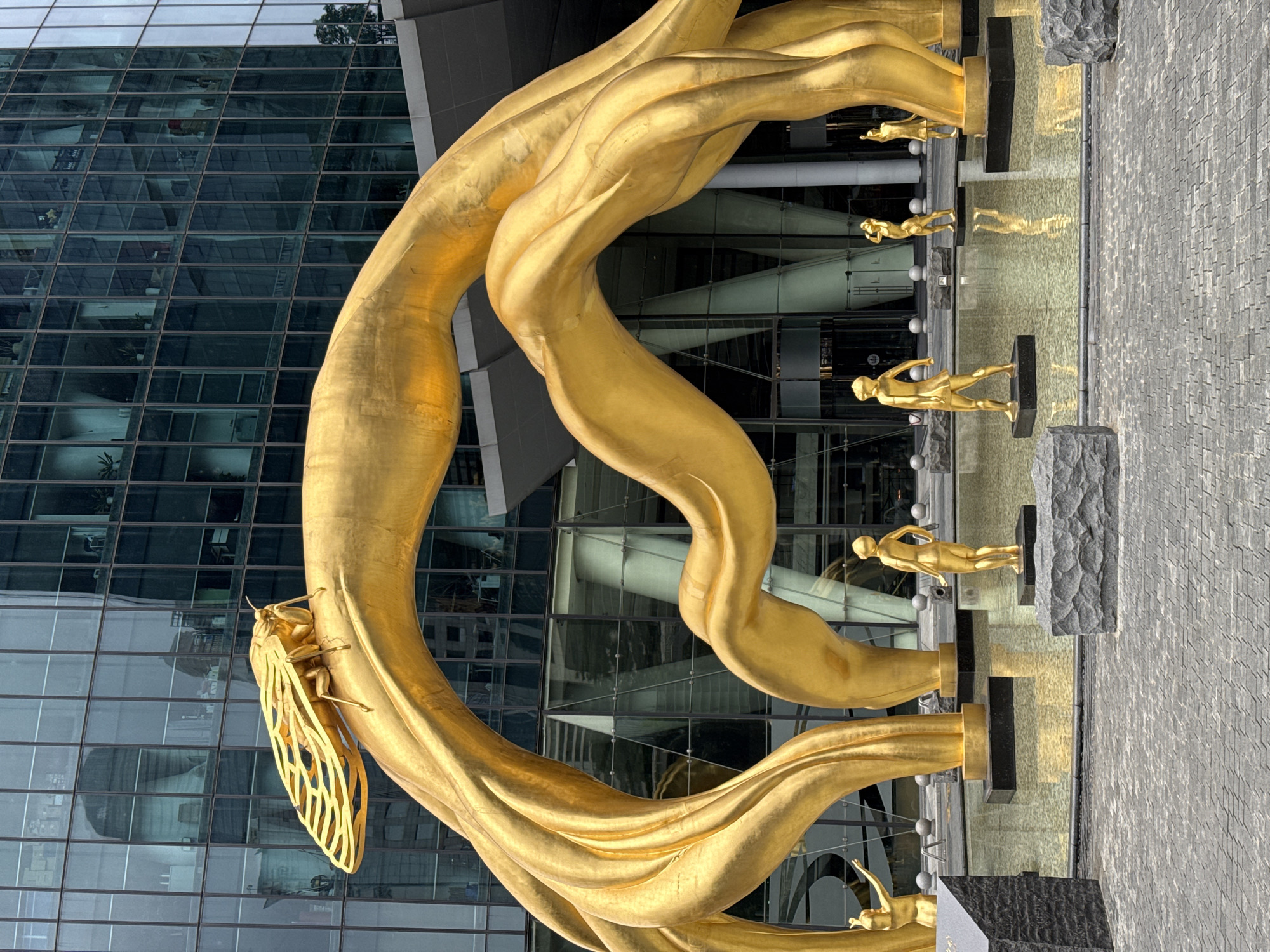 Golden cicada sculpture documented in Guangzhou's Tianhe District
