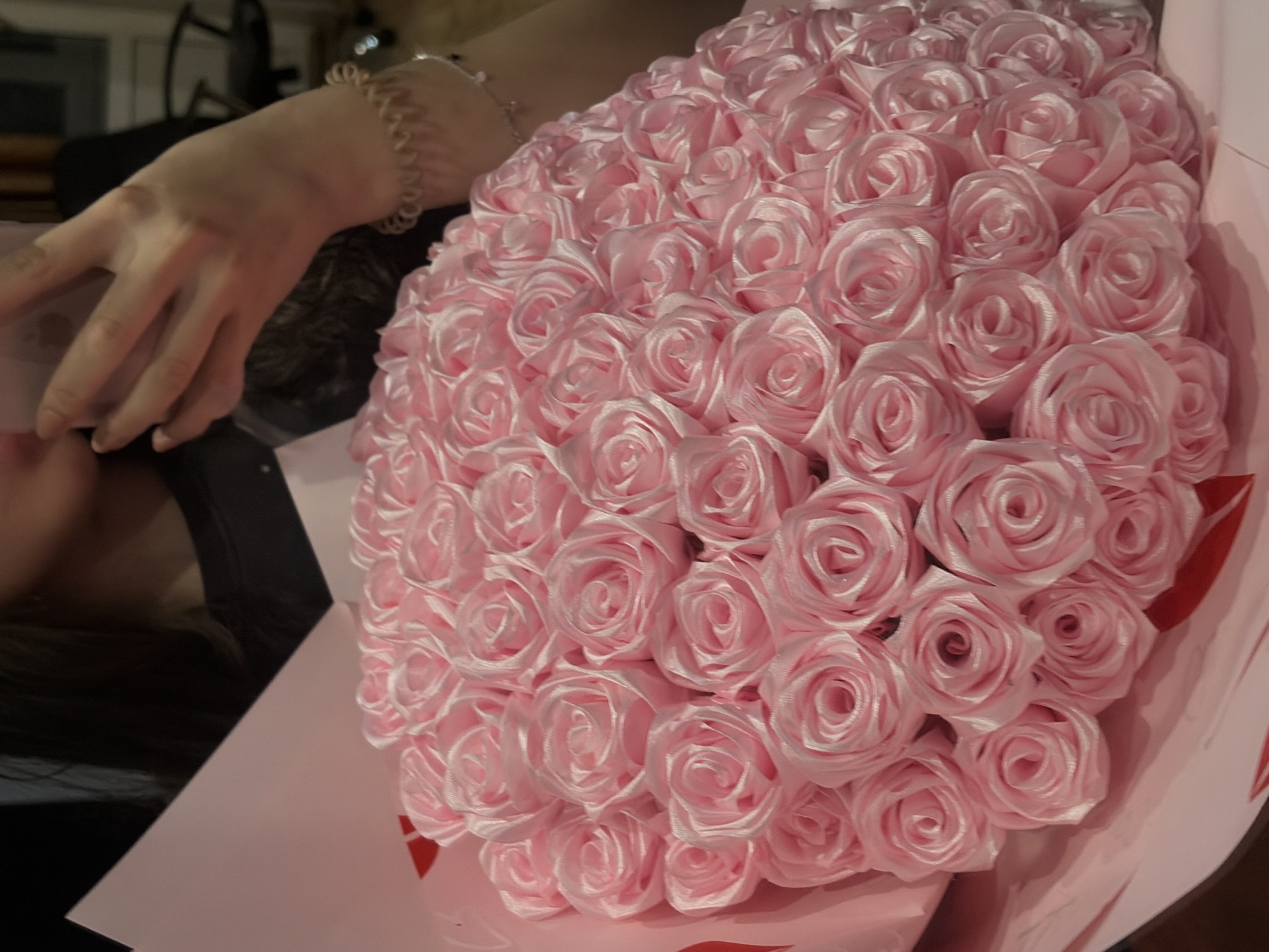Personal celebration documented with gifts, flowers, pet in Tuymazy