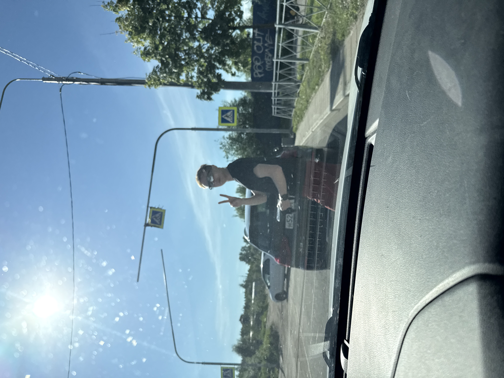 Street encounter documented in Pargolovo, Russia during sunny afternoon