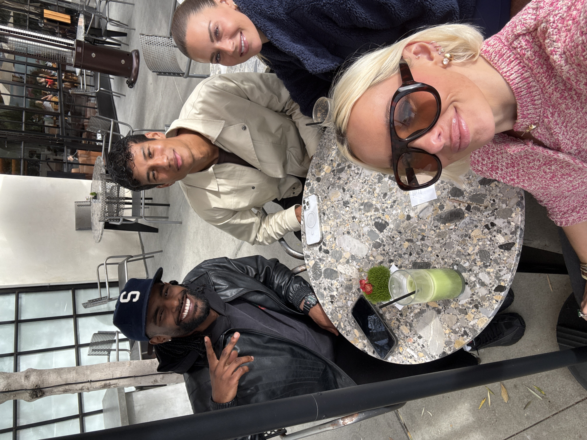 Late-night gathering of four at Los Angeles outdoor café