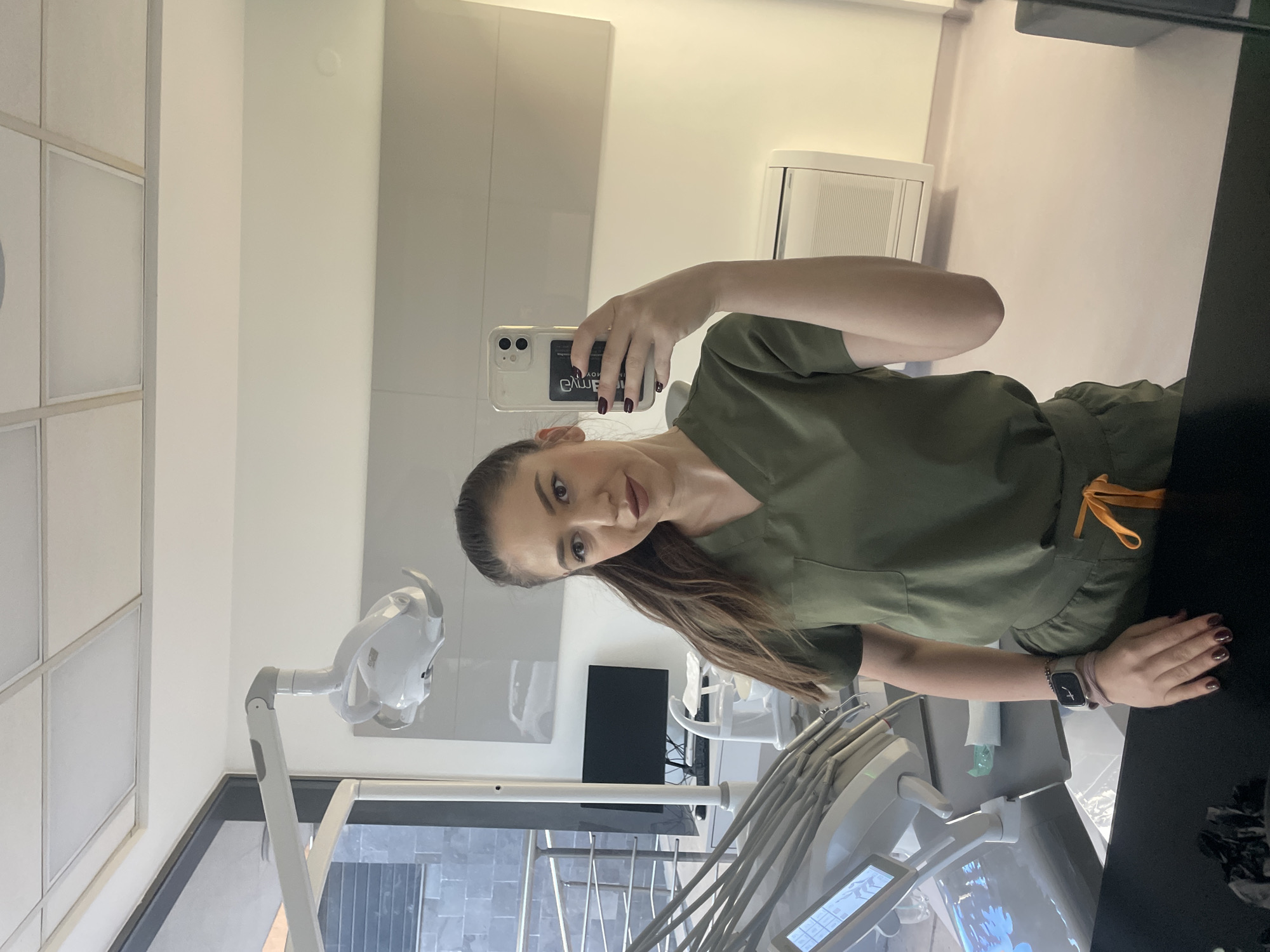 Dental worker takes early morning selfies in Sofia office