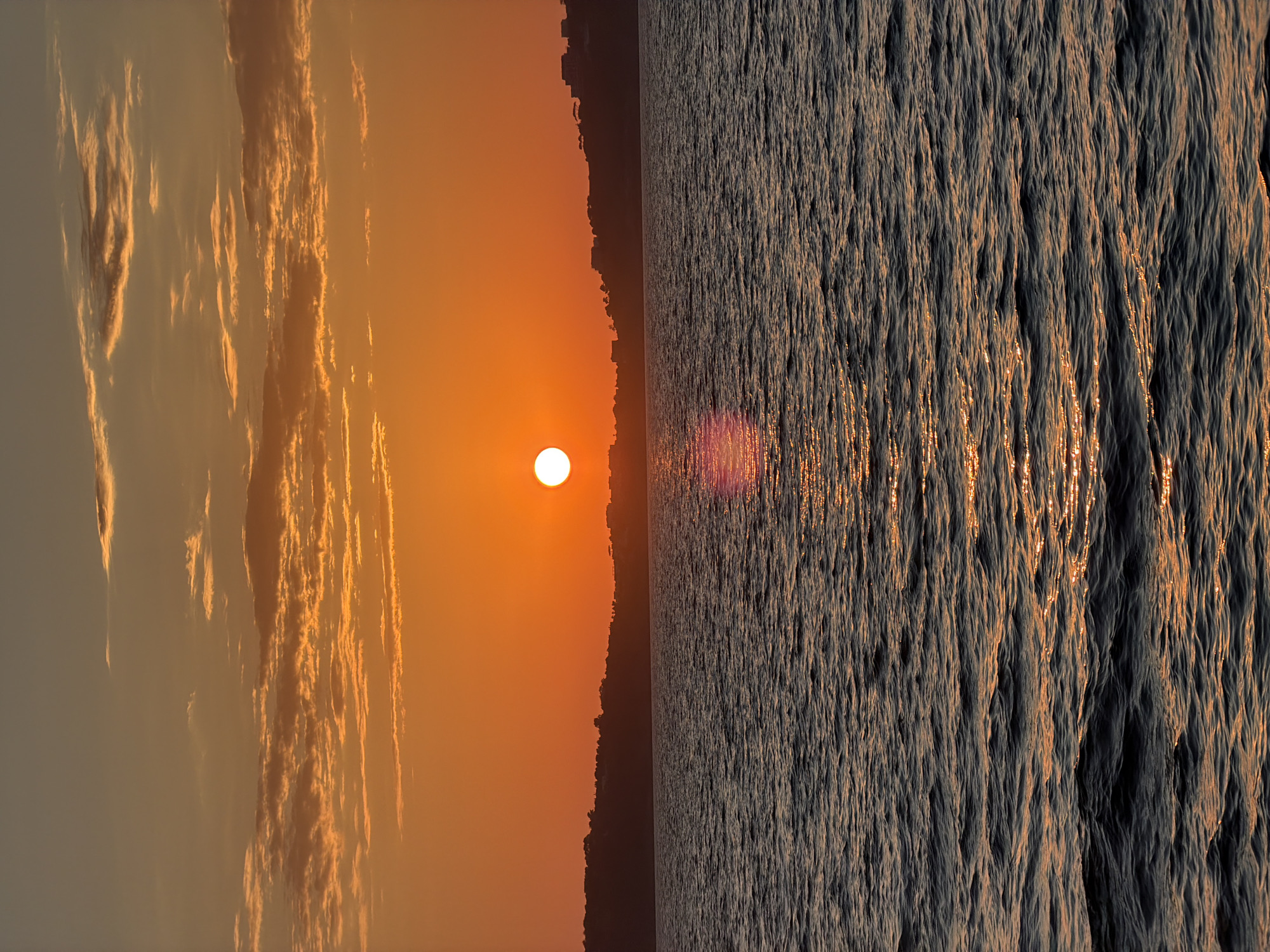 Sunset observed over waters of Procida, Italy