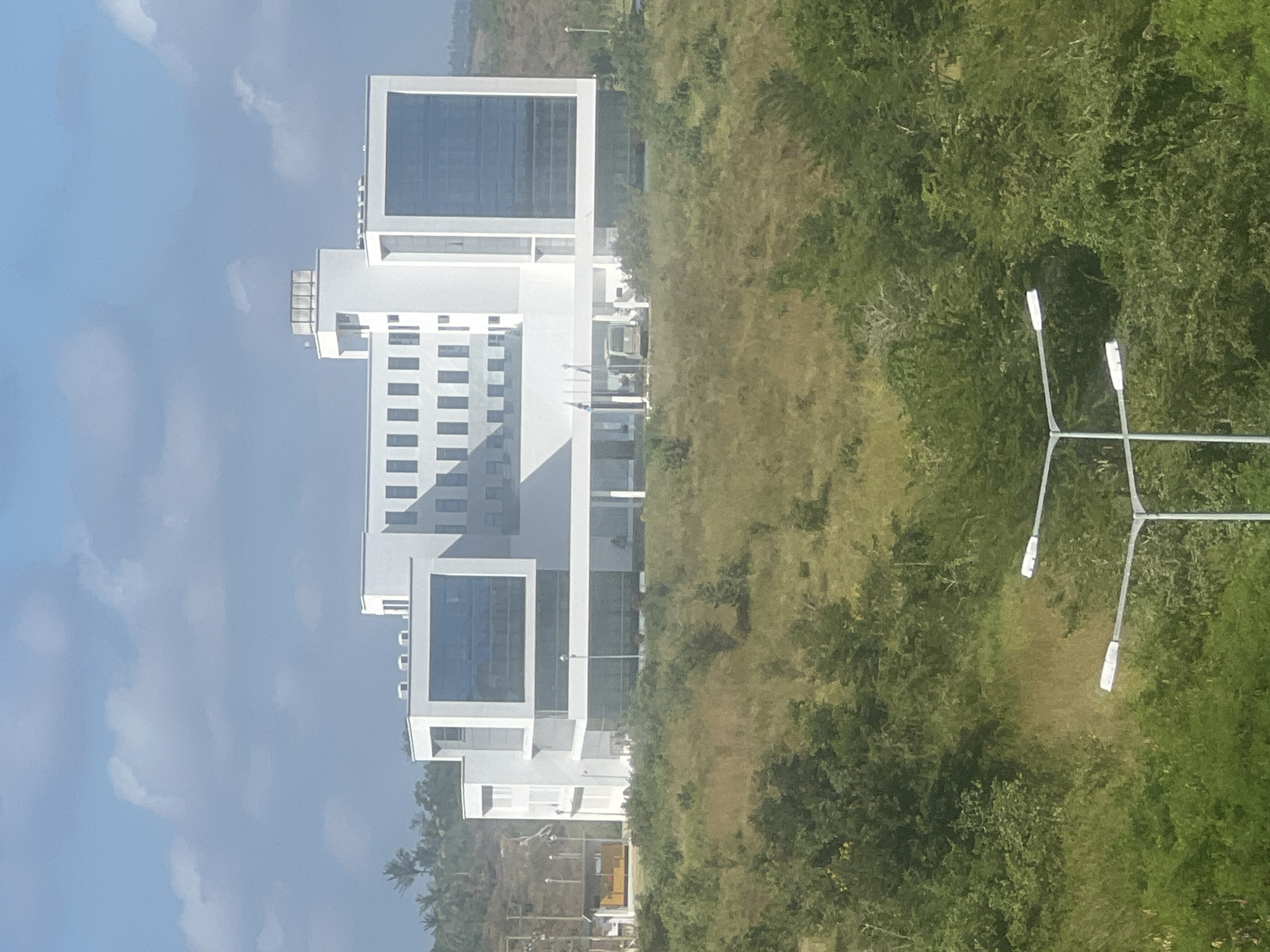 Modern white multi-story building in Mloganzila, Tanzania