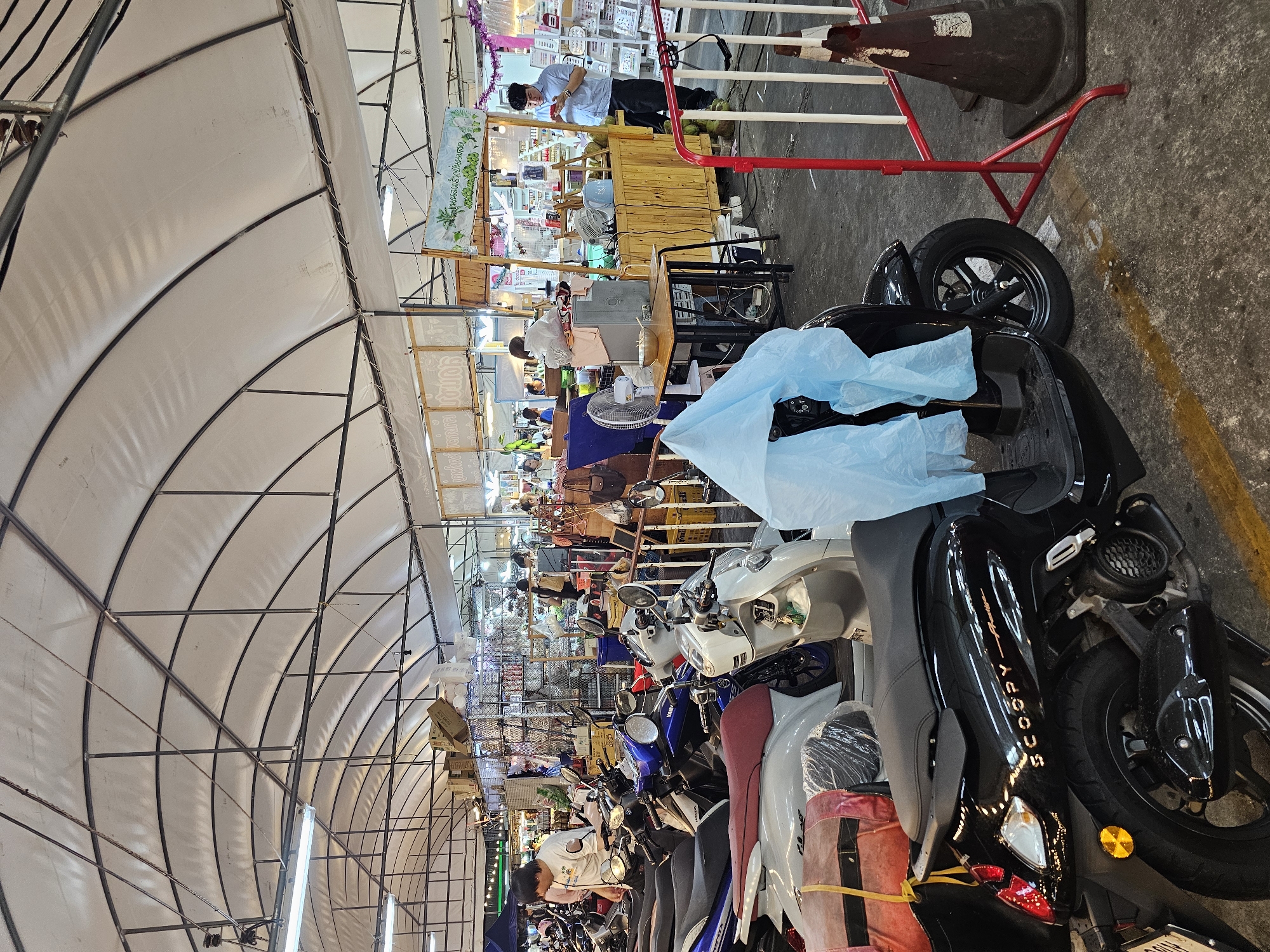Bangkok street scene: markets, durian, and a rainy sidewalk
