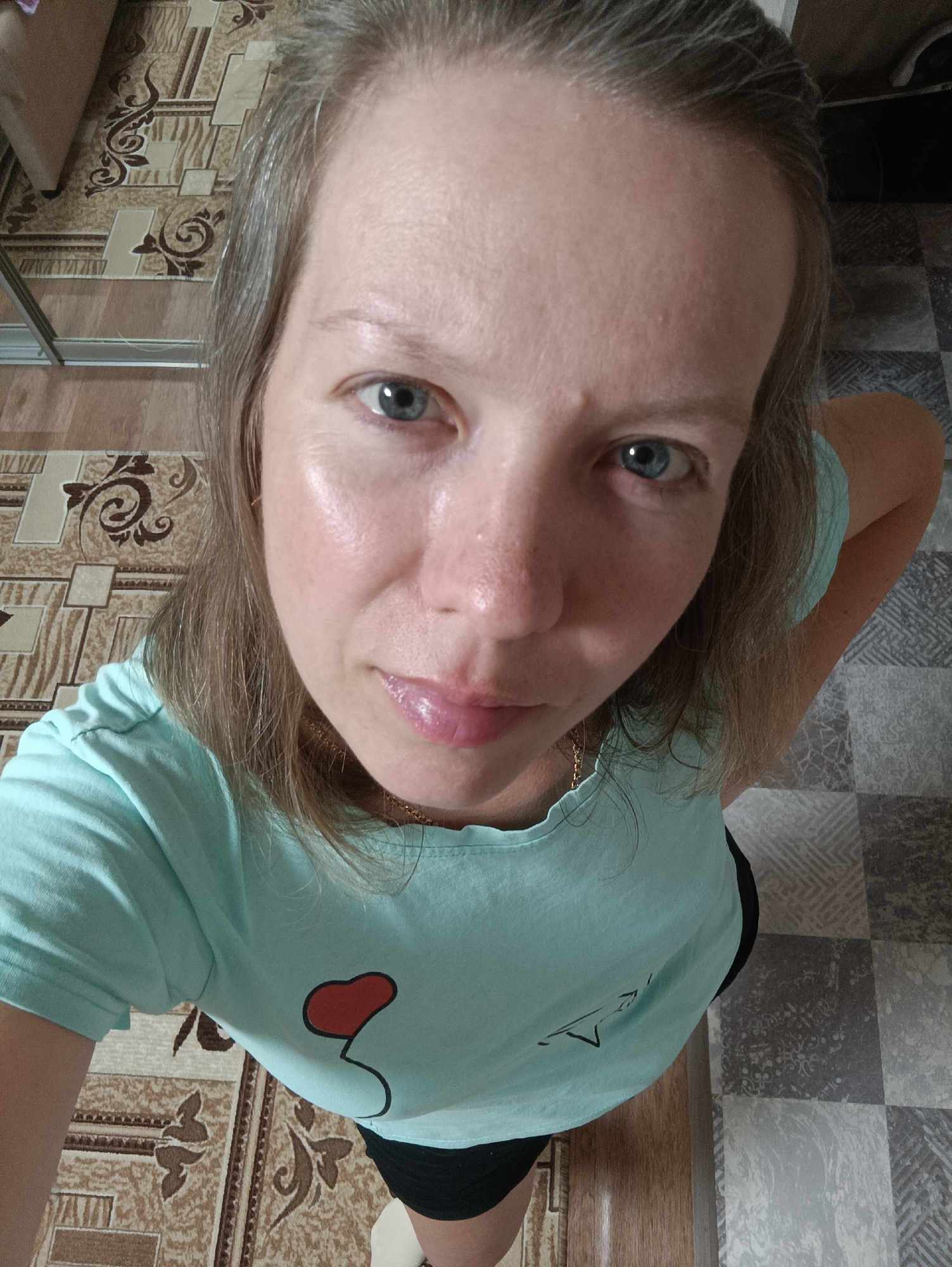 Woman takes selfies in Chaikovsky, Russia apartment