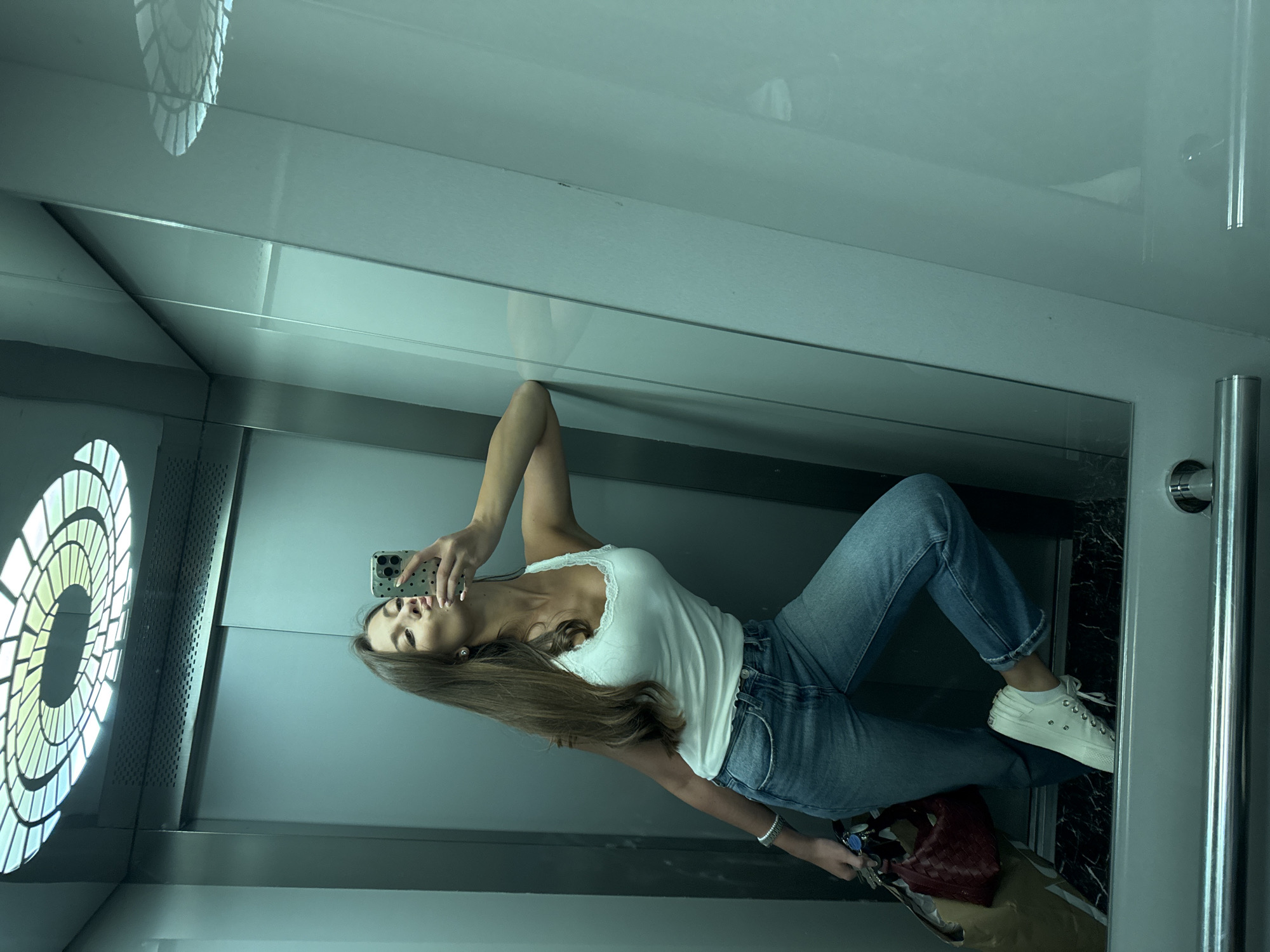 Woman takes multiple selfies in Burgas building locations