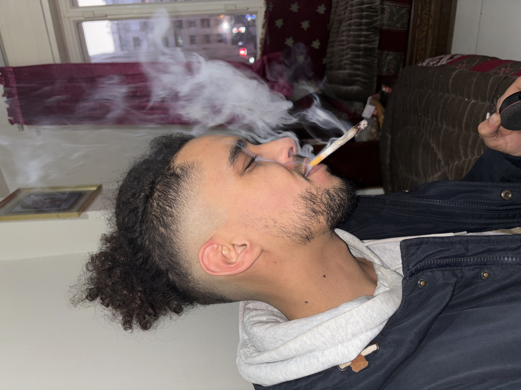 Young man documented in various indoor, outdoor settings in Tanger