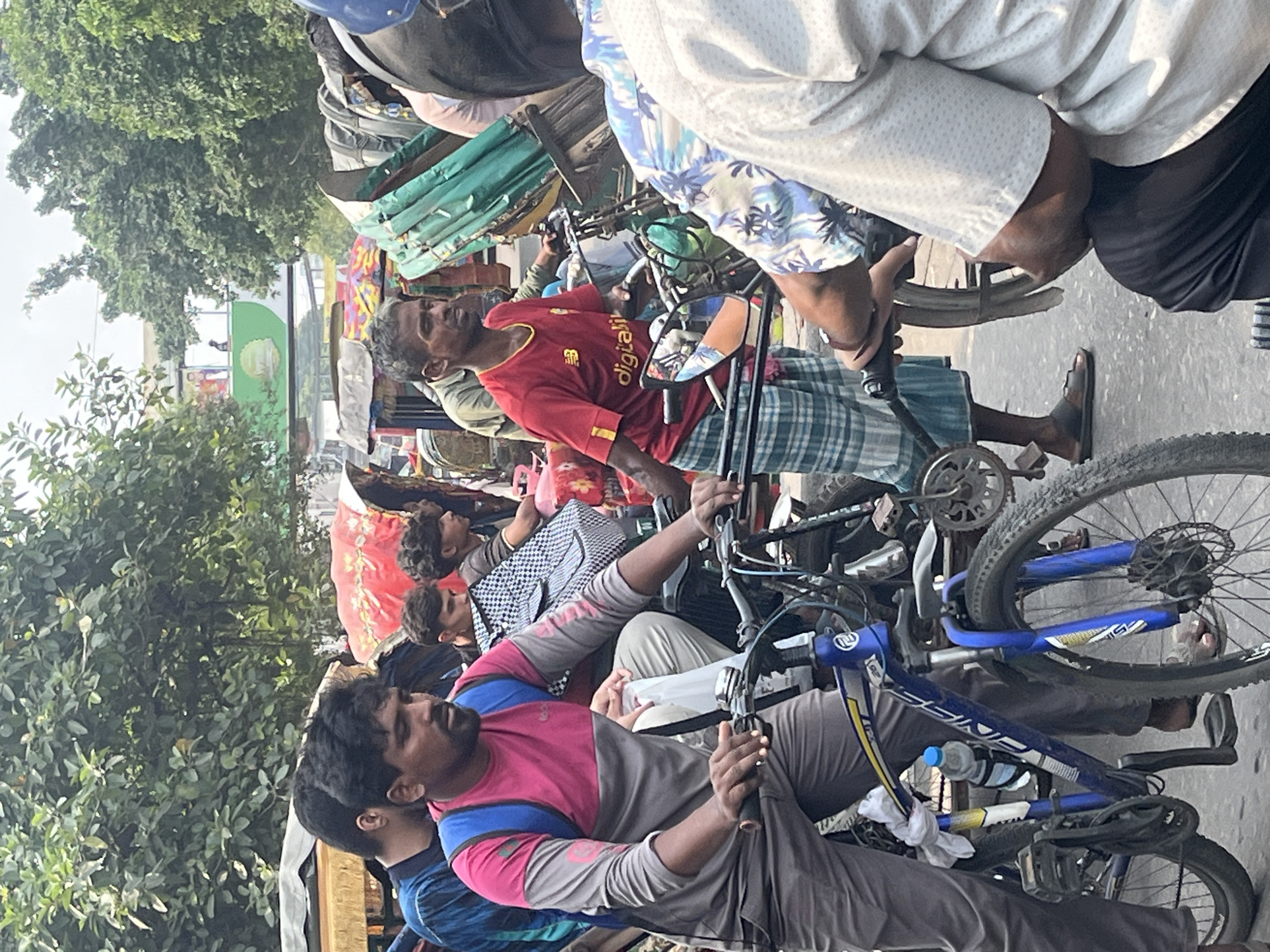 Morning street life documented in Dhaka transportation hub