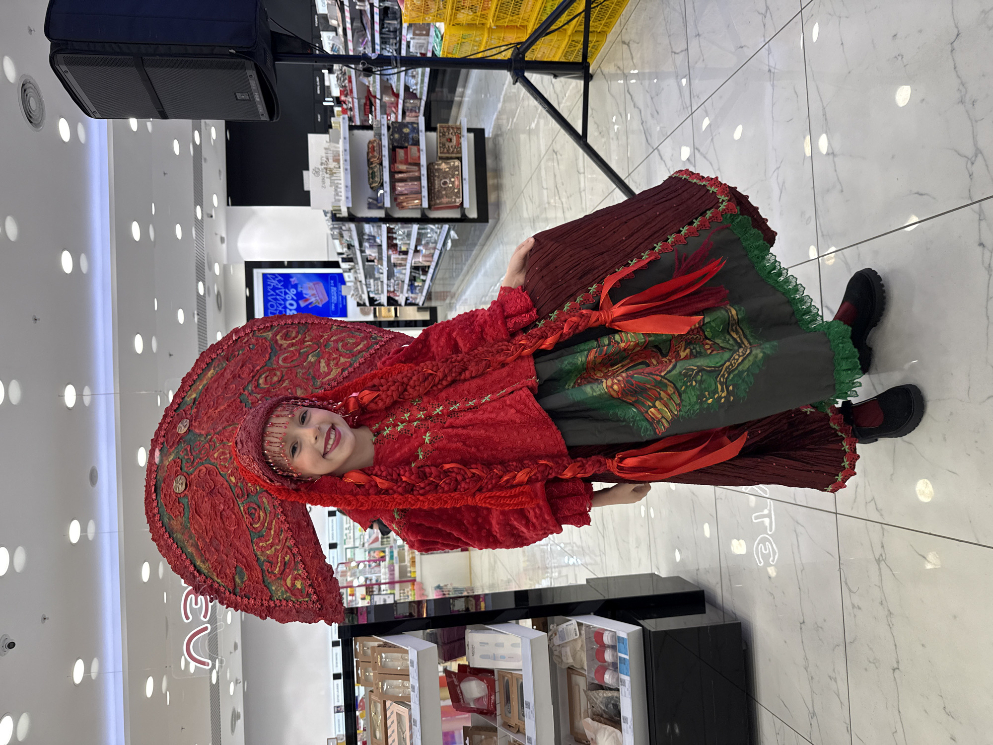 Traditional attire and pastry displays spotted in Vladivostok shopping areas