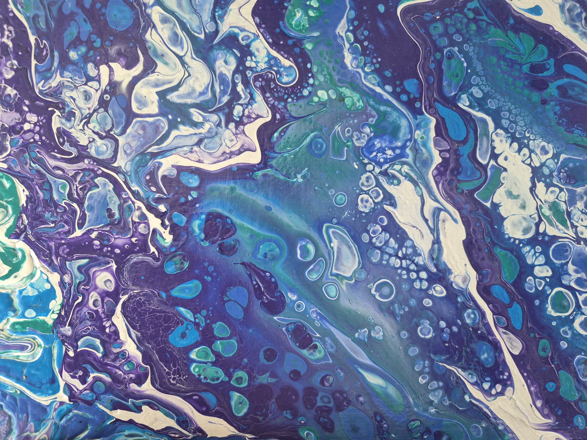 Acrylic pour paintings up close in Minsk