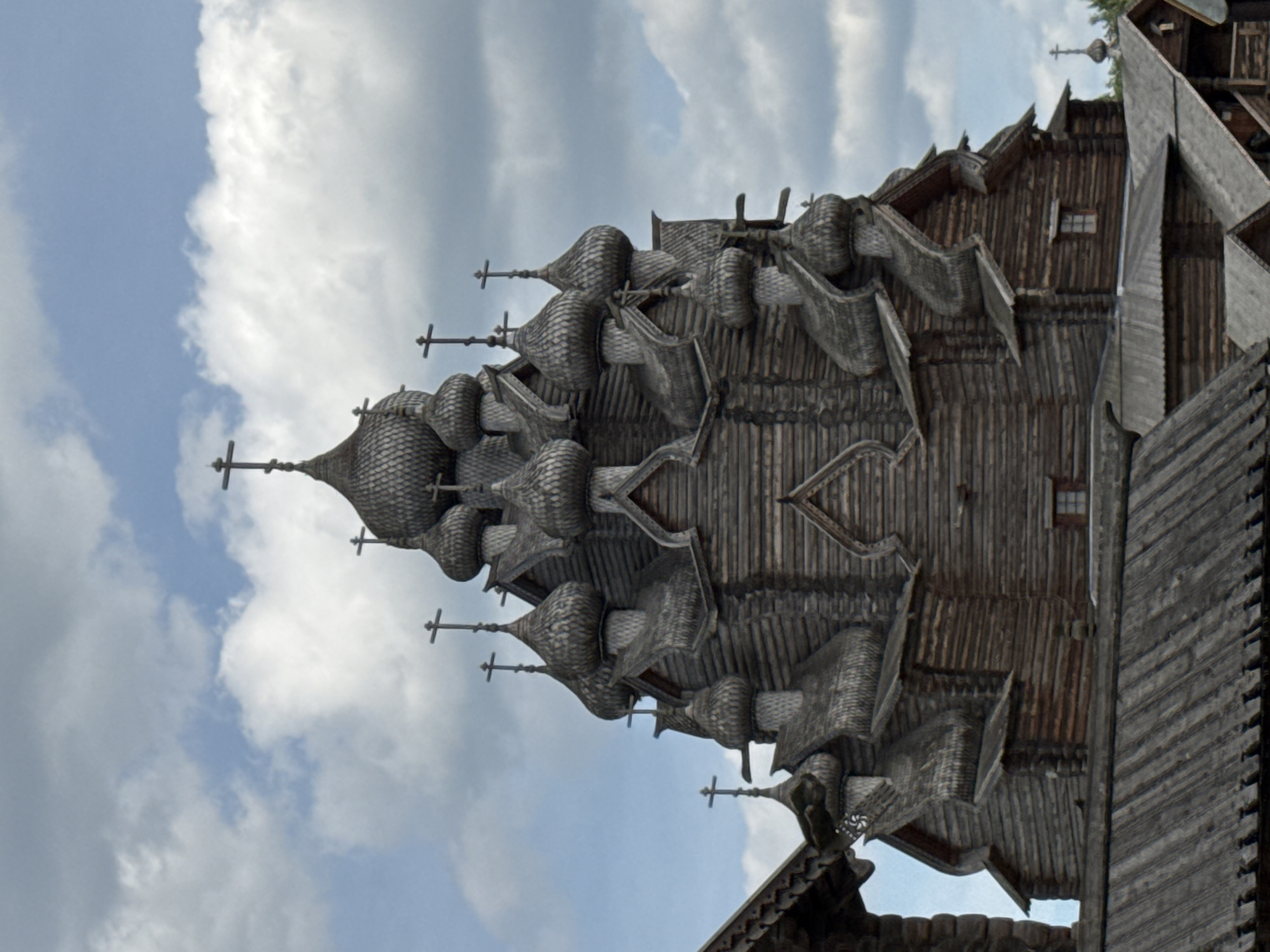 Wooden Orthodox church and playground in Petro-Slavyanka, Russia