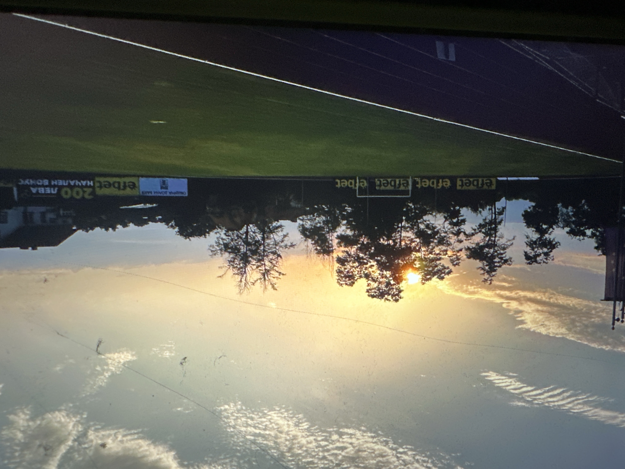 Empty stadium in Kostenets catches a vivid summer sunset