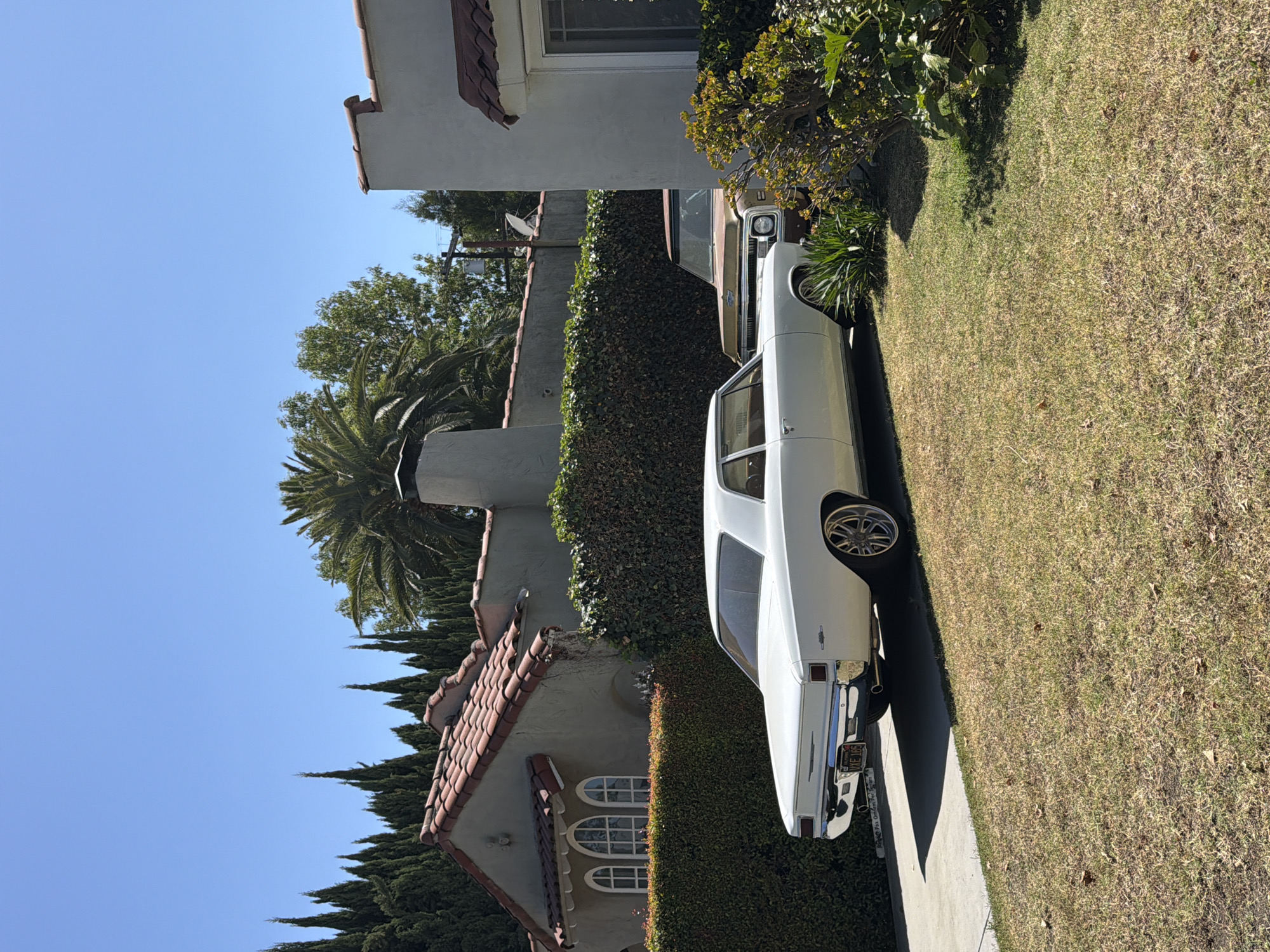 White sedan spotted at Los Angeles residential property