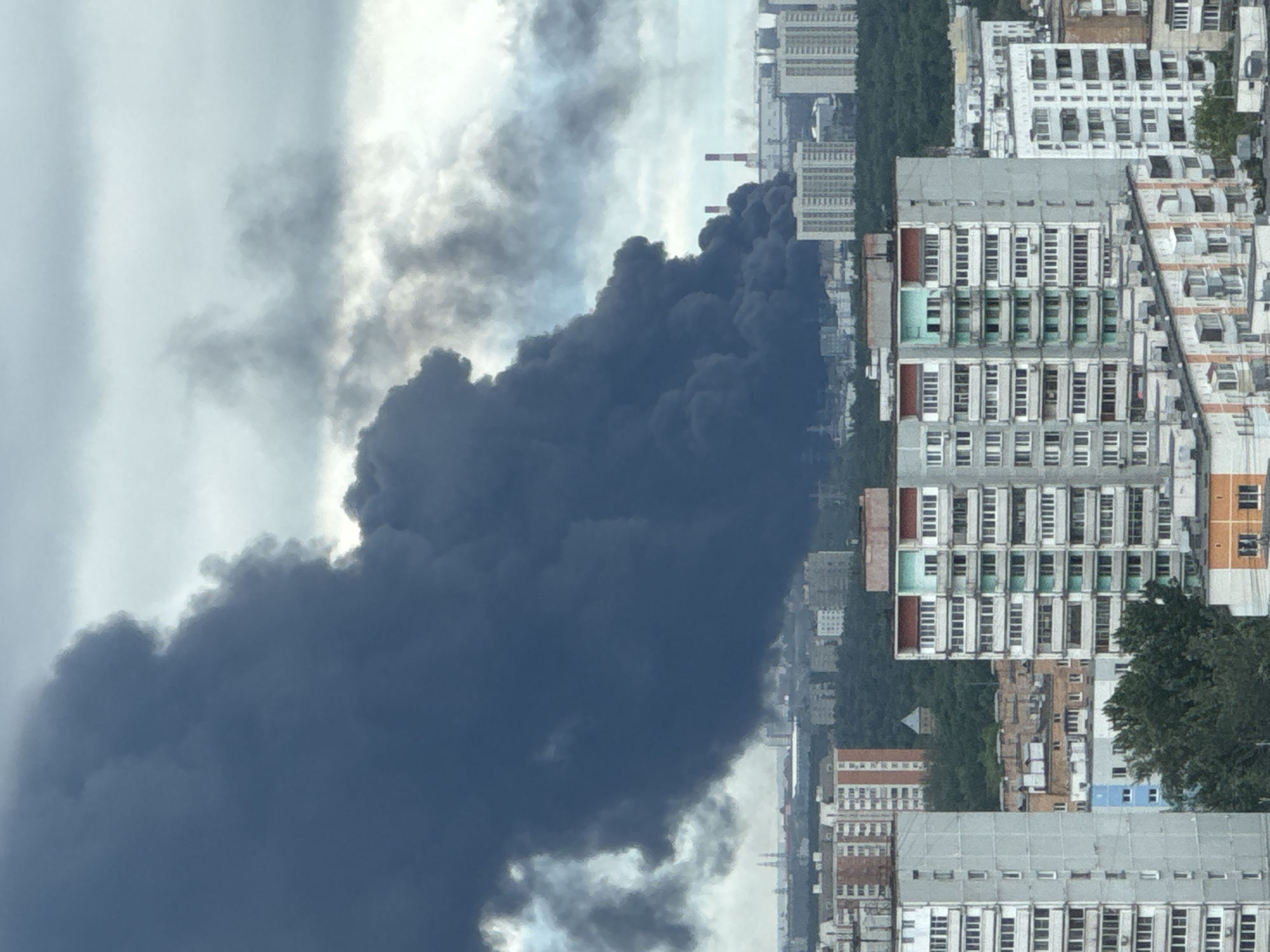 Heavy black smoke rises over Moscow from apparent industrial fire