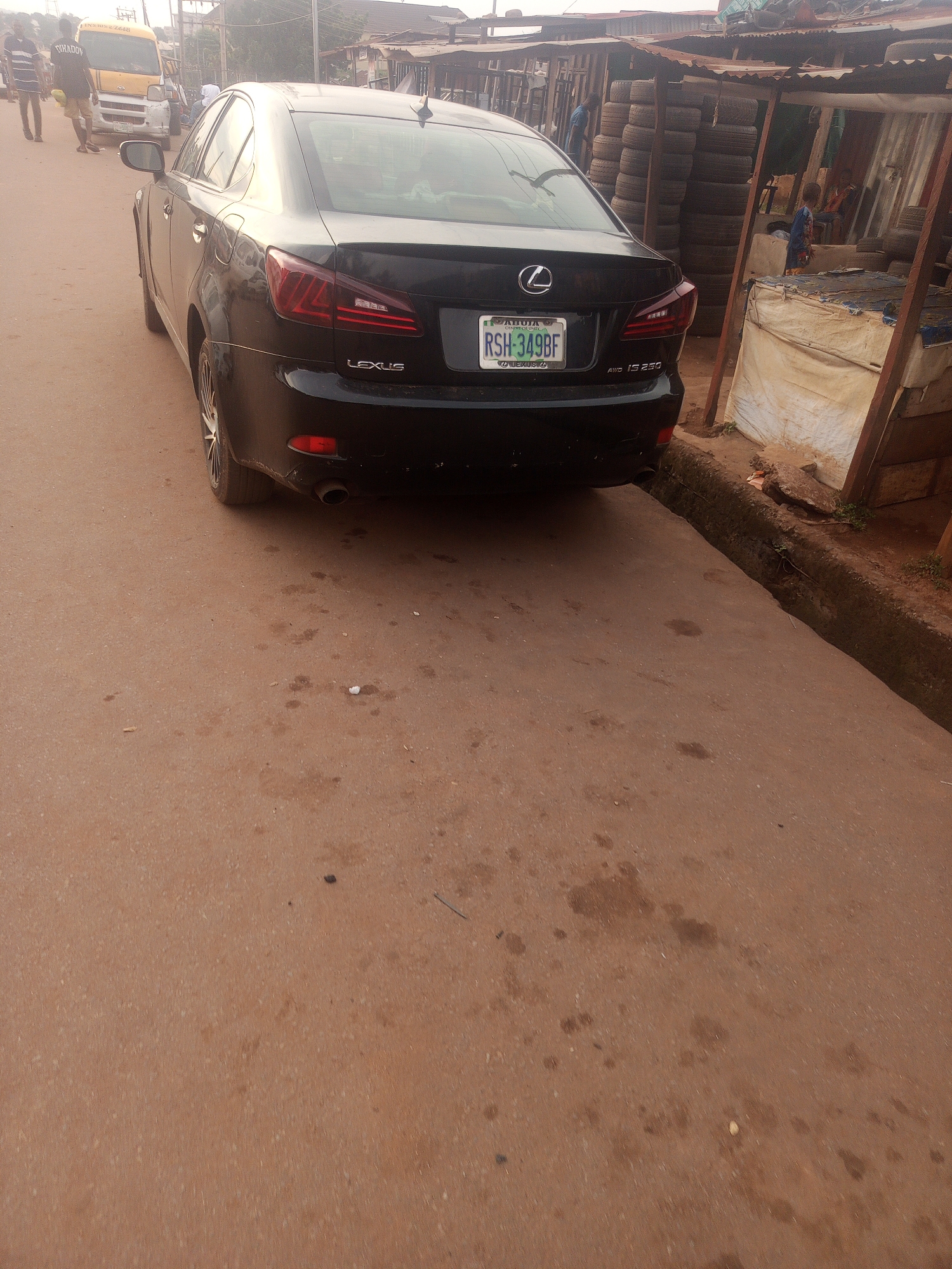 Street life and commerce in Enugu on a June afternoon