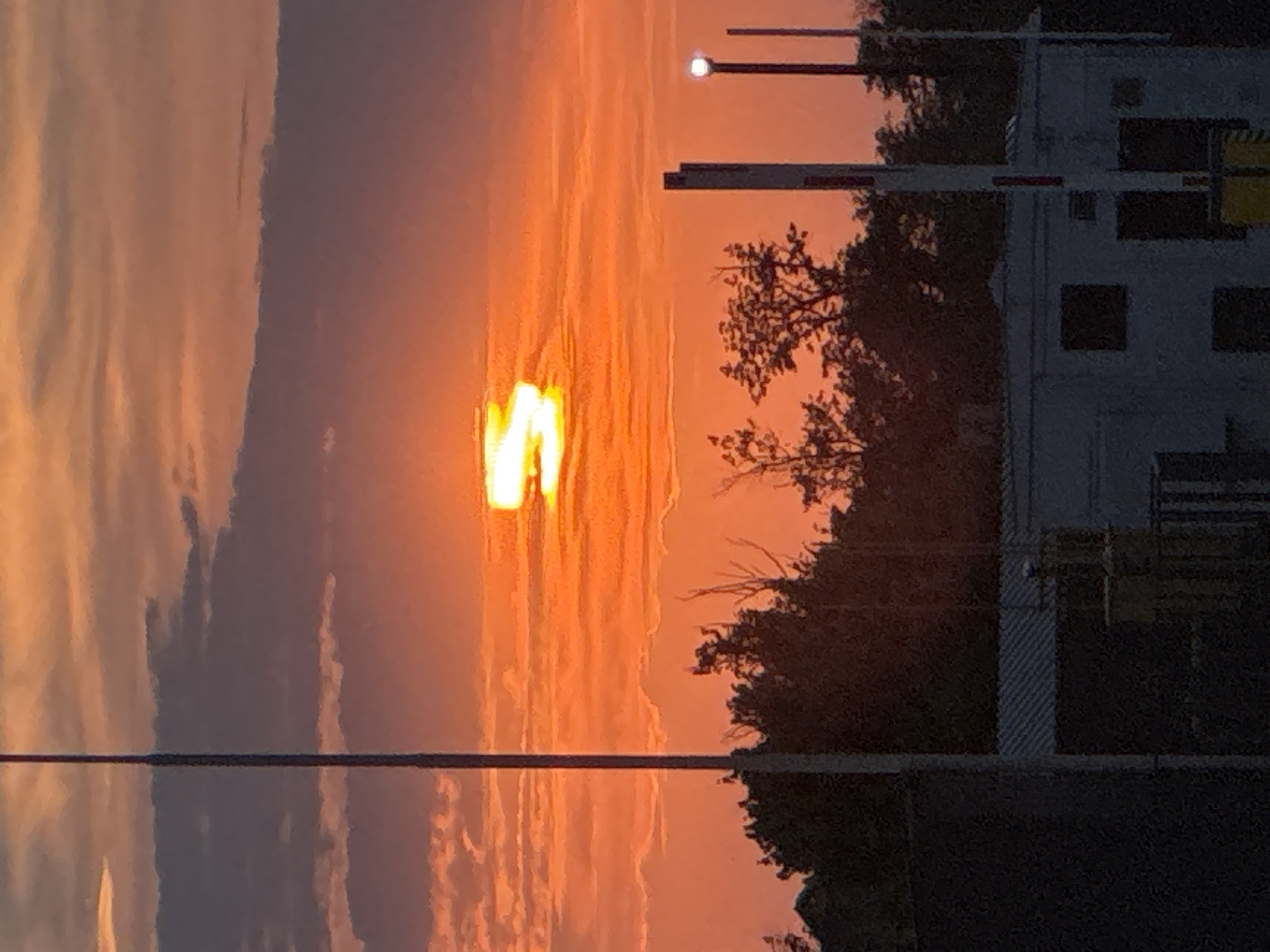 Dramatic sunset observed across Krasnodar, Russia industrial suburbs