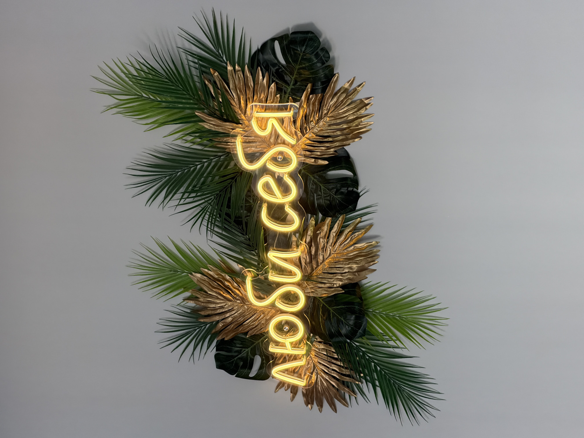 Decorated OTTO sign spotted with tropical plants in Russia