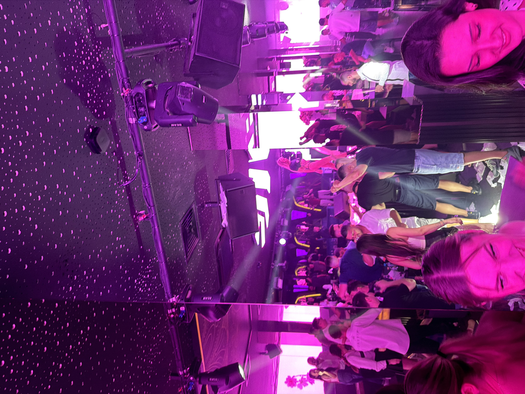 Late-night club scene in Sofia with neon lights and hookah